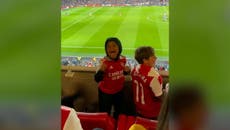 Kim Kardashian films son Saint cheering for Arsenal during surprise football game appearance