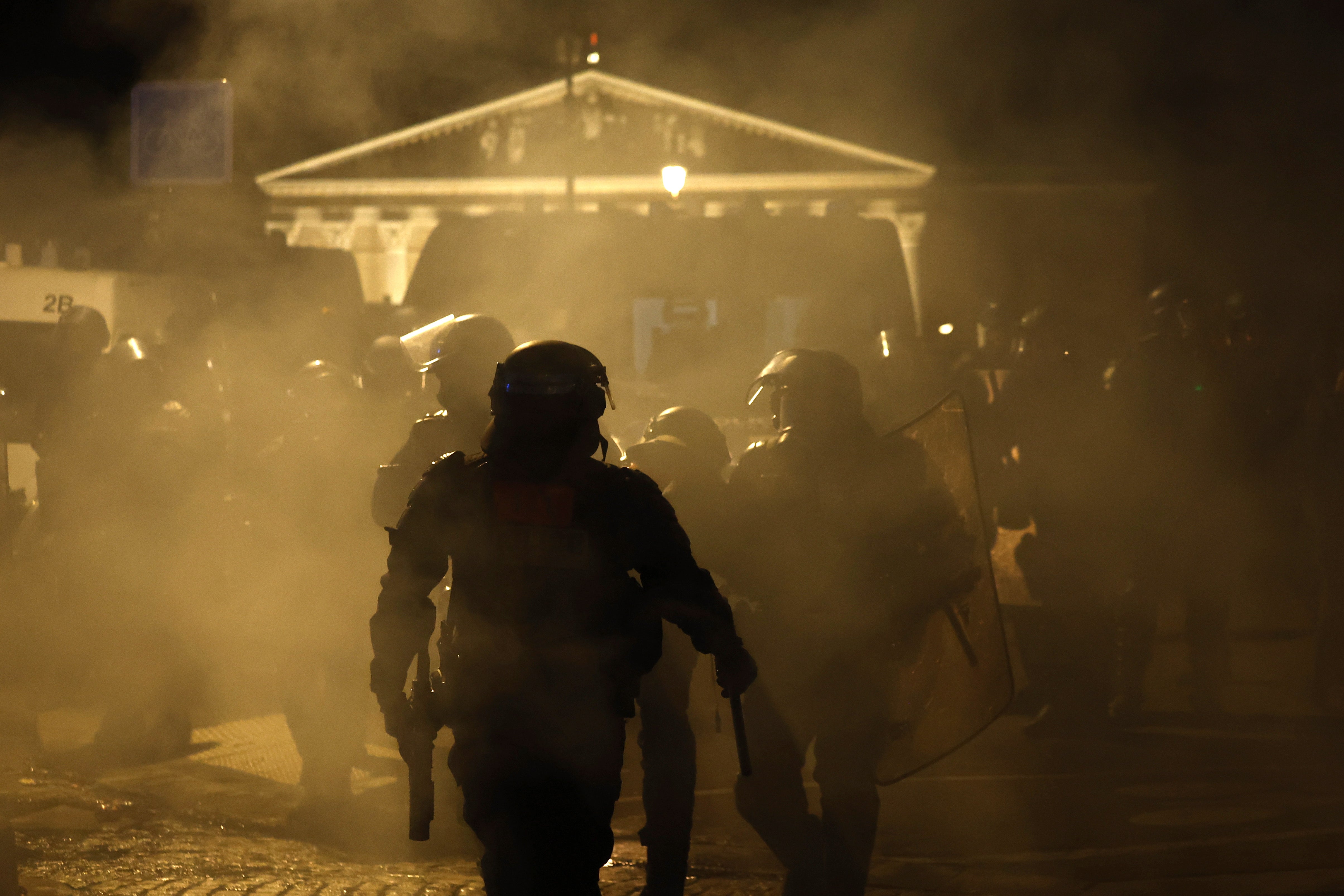 French police face protesters in the capital