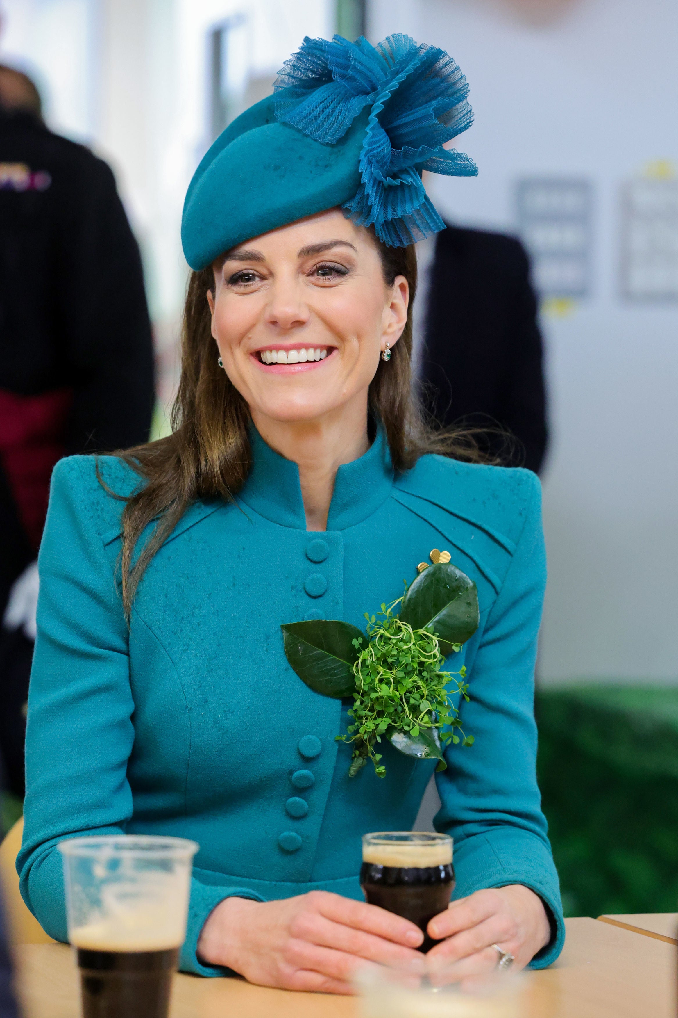 The Princess of Wales meets members of the Irish Guards and enjoys a glass of Guinness during a visit to the 1st Battalion Irish Guards for the St Patrick's Day Parade, at Mons Barracks in Aldershot