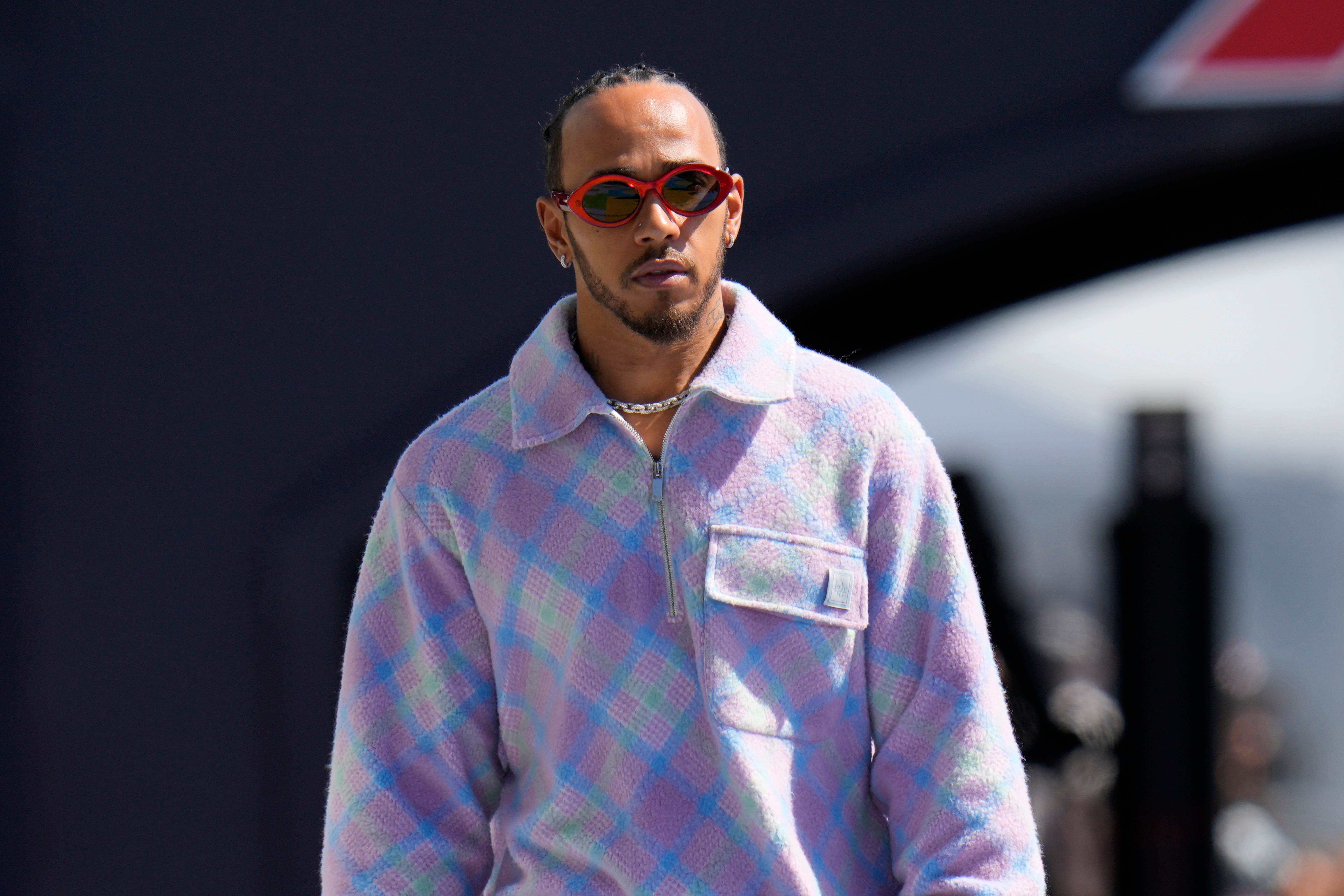 Lewis Hamilton arrives in the Jeddah paddock on Friday (Hassan Ammar/AP)