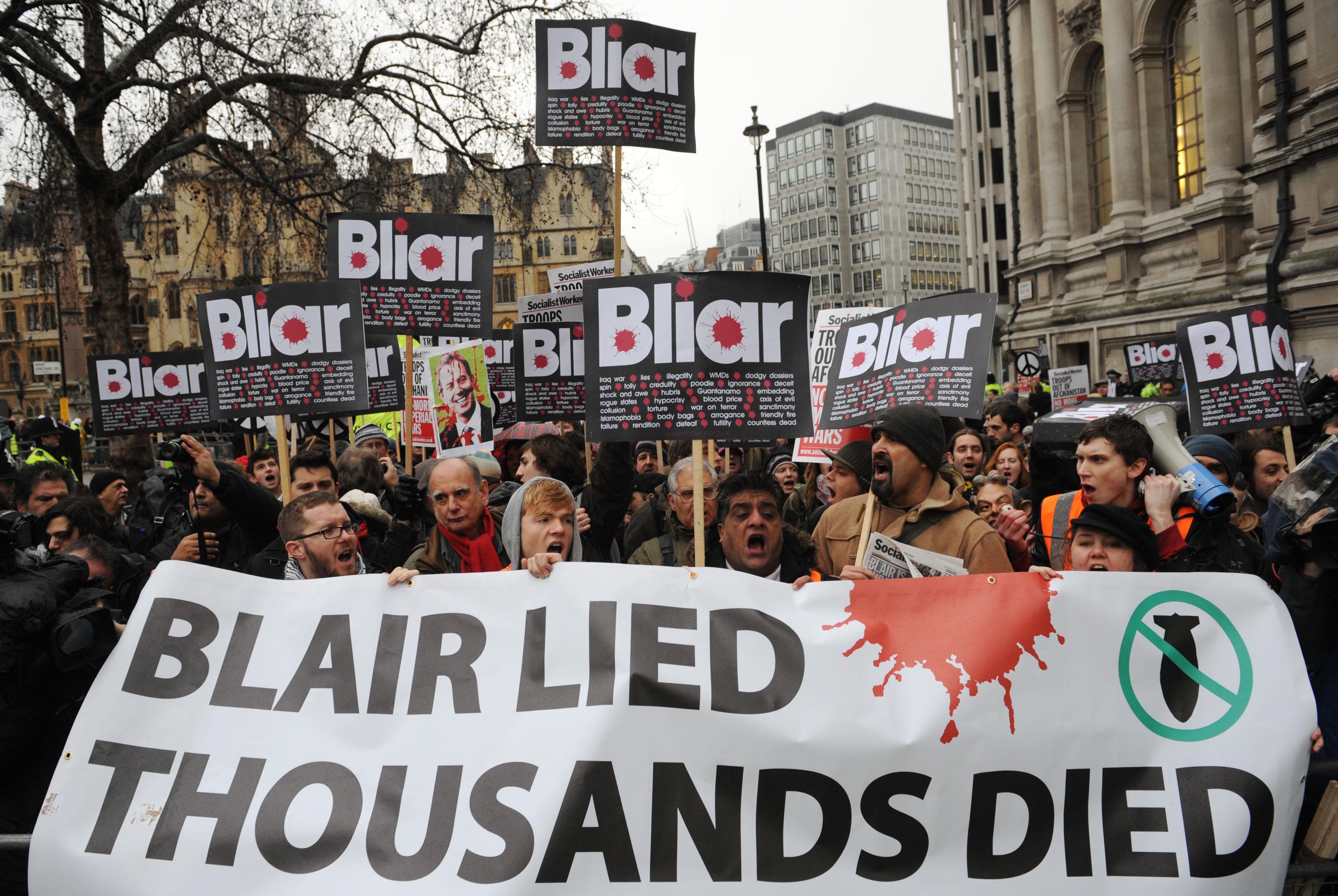 People protest outside where former prime minister Tony Blair was due to give evidence to the Chilcott Inquiry in January 2010