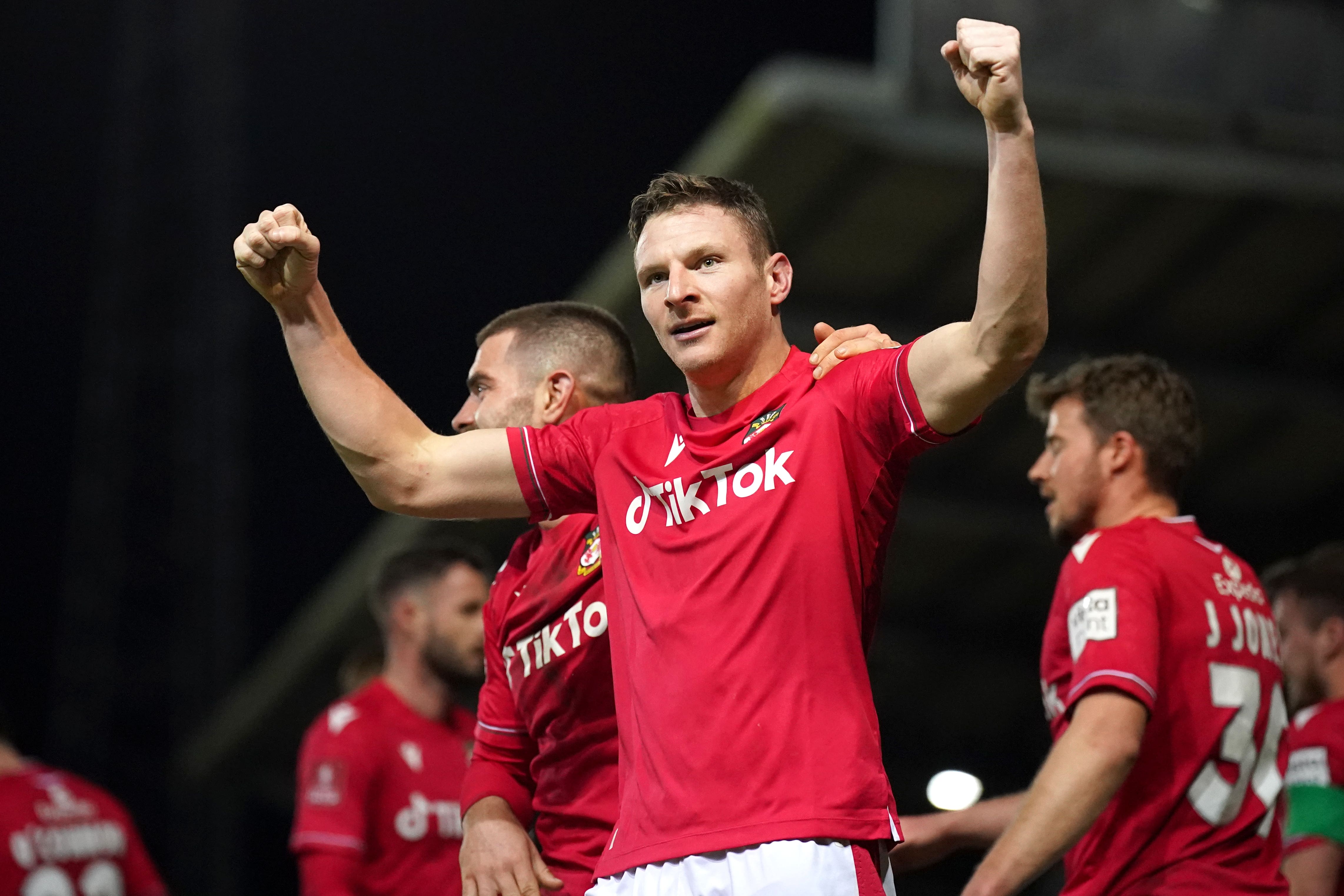 Paul Mullin scored twice to extend Wrexham’s lead at the top of the National League (Peter Byrne/PA)