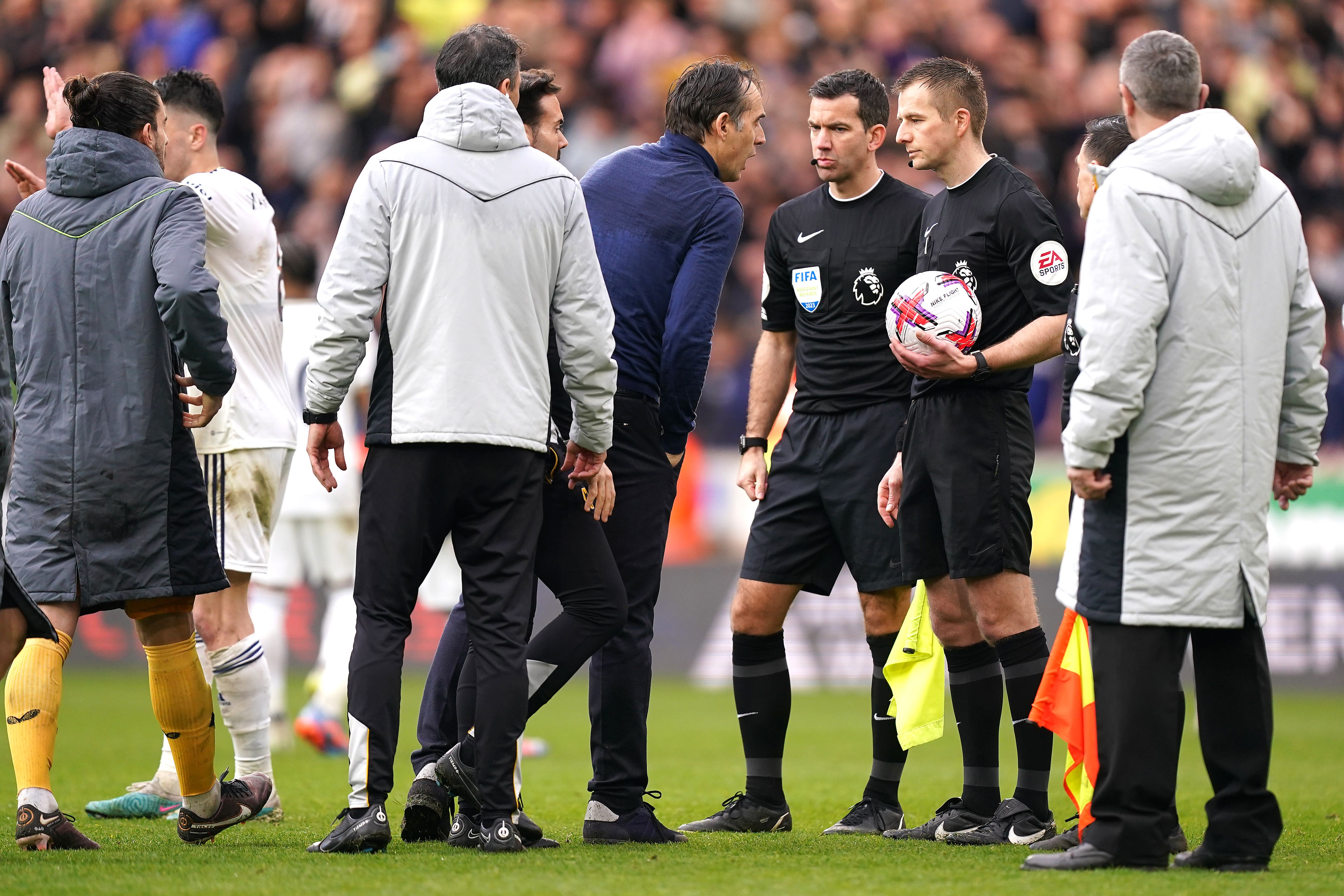 Julen Lopetegui, centre left, speaks to referee Michael Salisbury after the final whistle (Mike Egerton/PA)