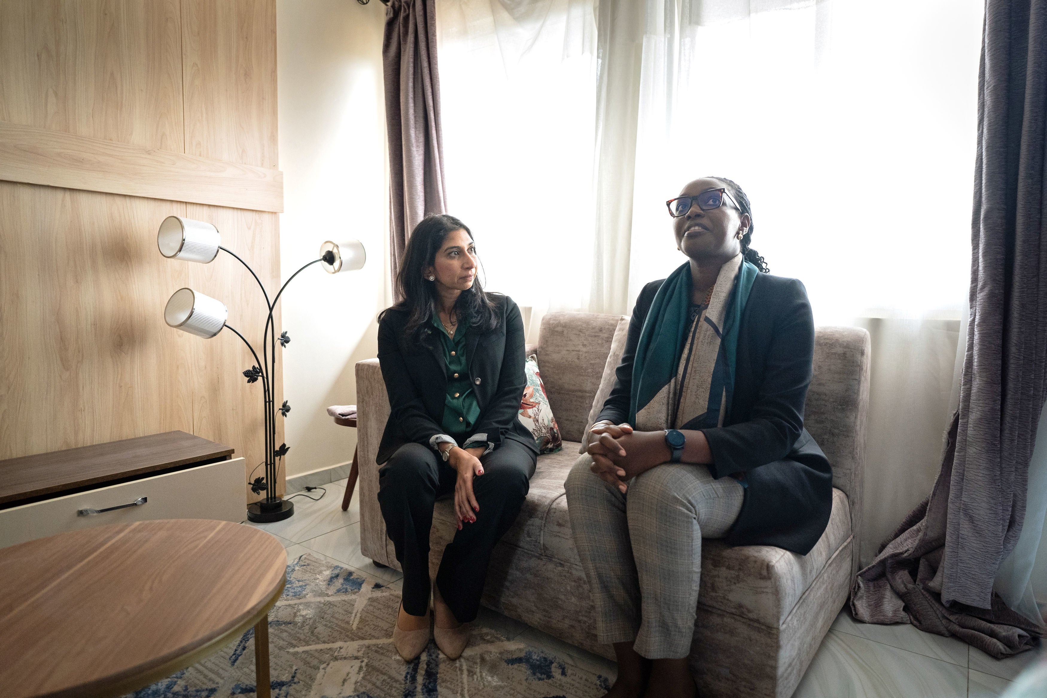 Braverman visits a newly built house with Rwandan minister Claudette Irere