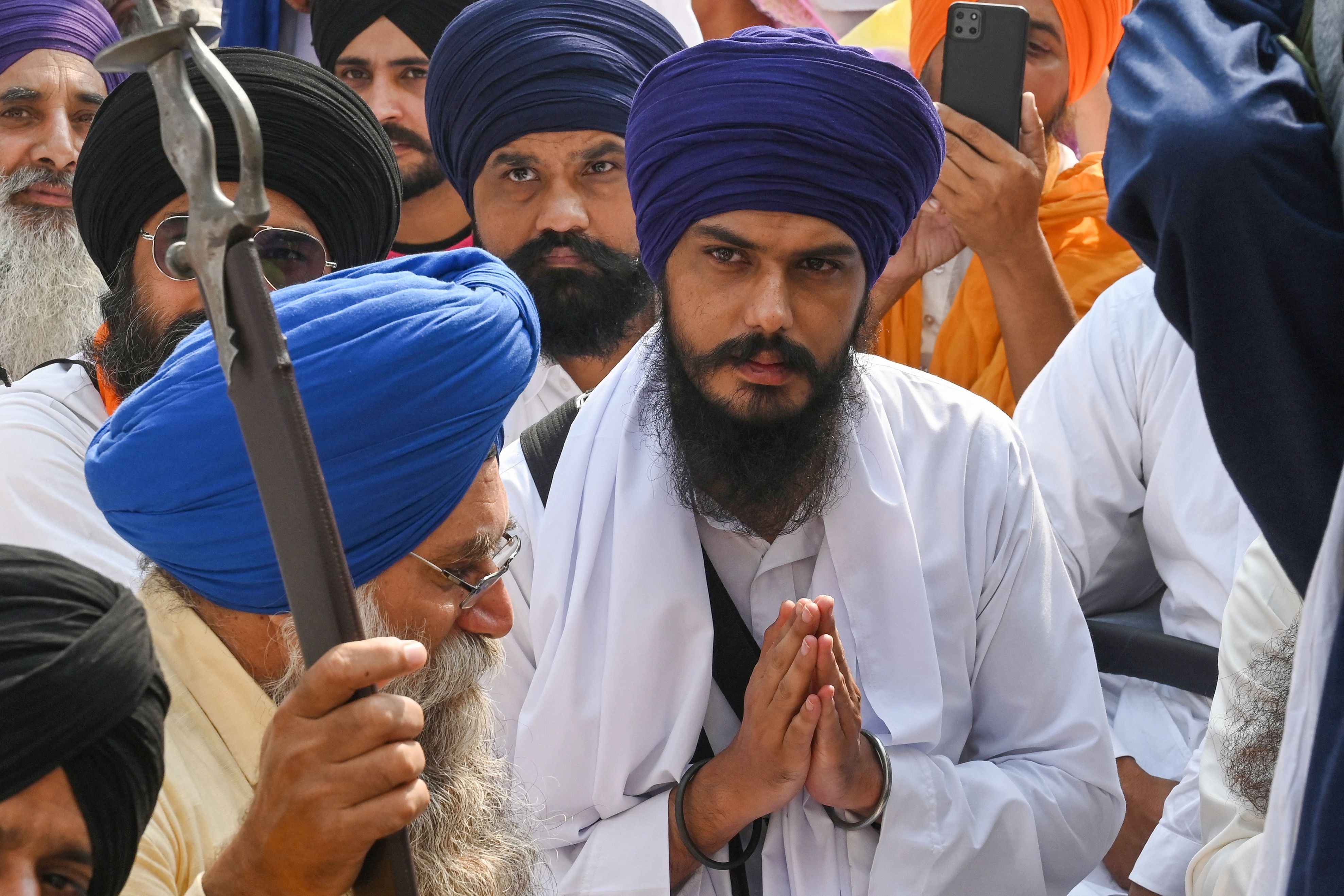 File: Amritpal Singh along with devotees take part in Sikh initiation rite ceremony also known as Amrit Sanskar at Akal Takht Sahib in the Golden Temple in Amritsar