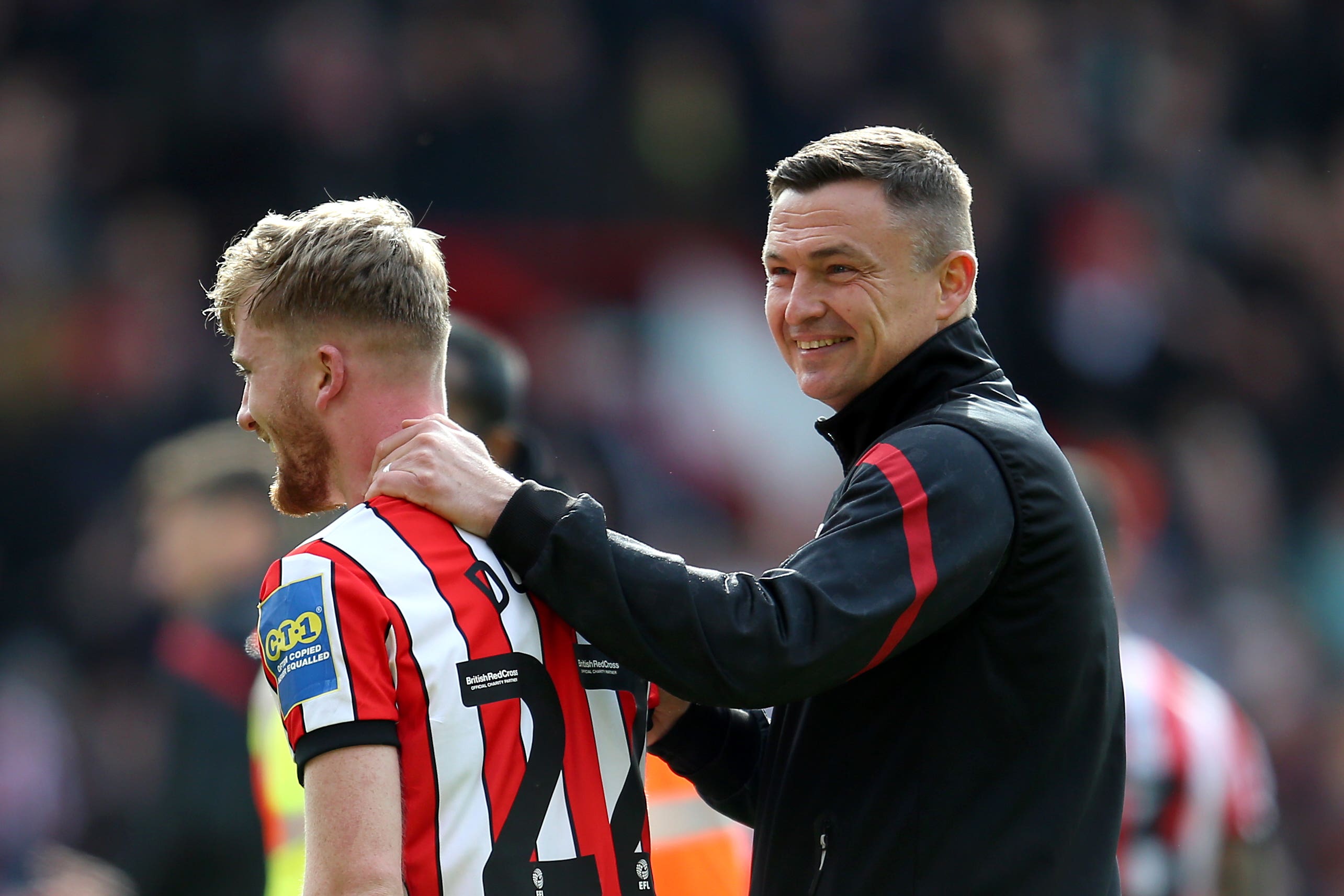 Sheffield United manager Paul Heckingbottom congratulates Tommy Doyle (Nigel French/PA).