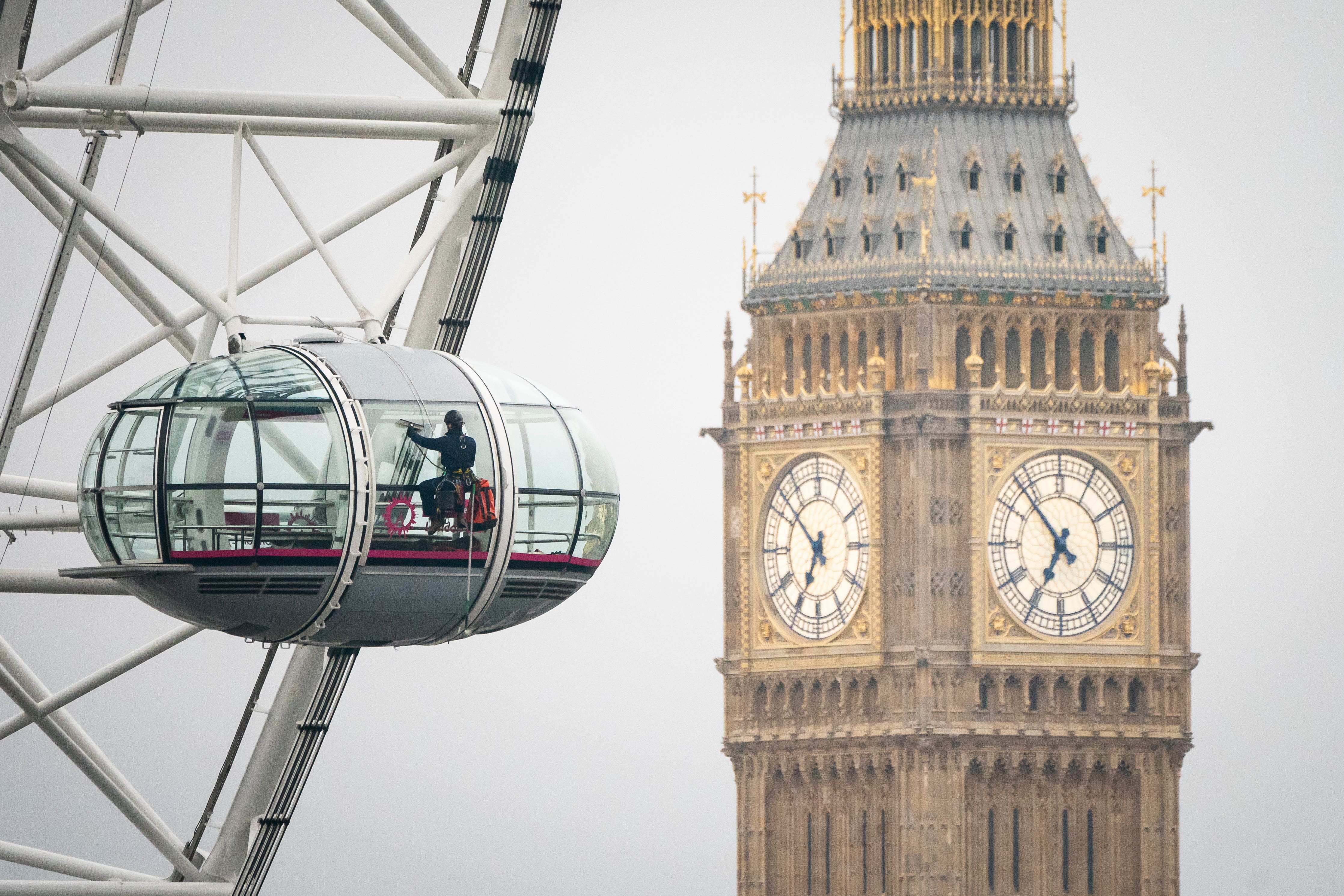 Staff spring clean pods on the lastminute.com London Eye in Westminster to ensure the 32 capsules are ready for the millions of visitors this year (Aaron Chown/PA)