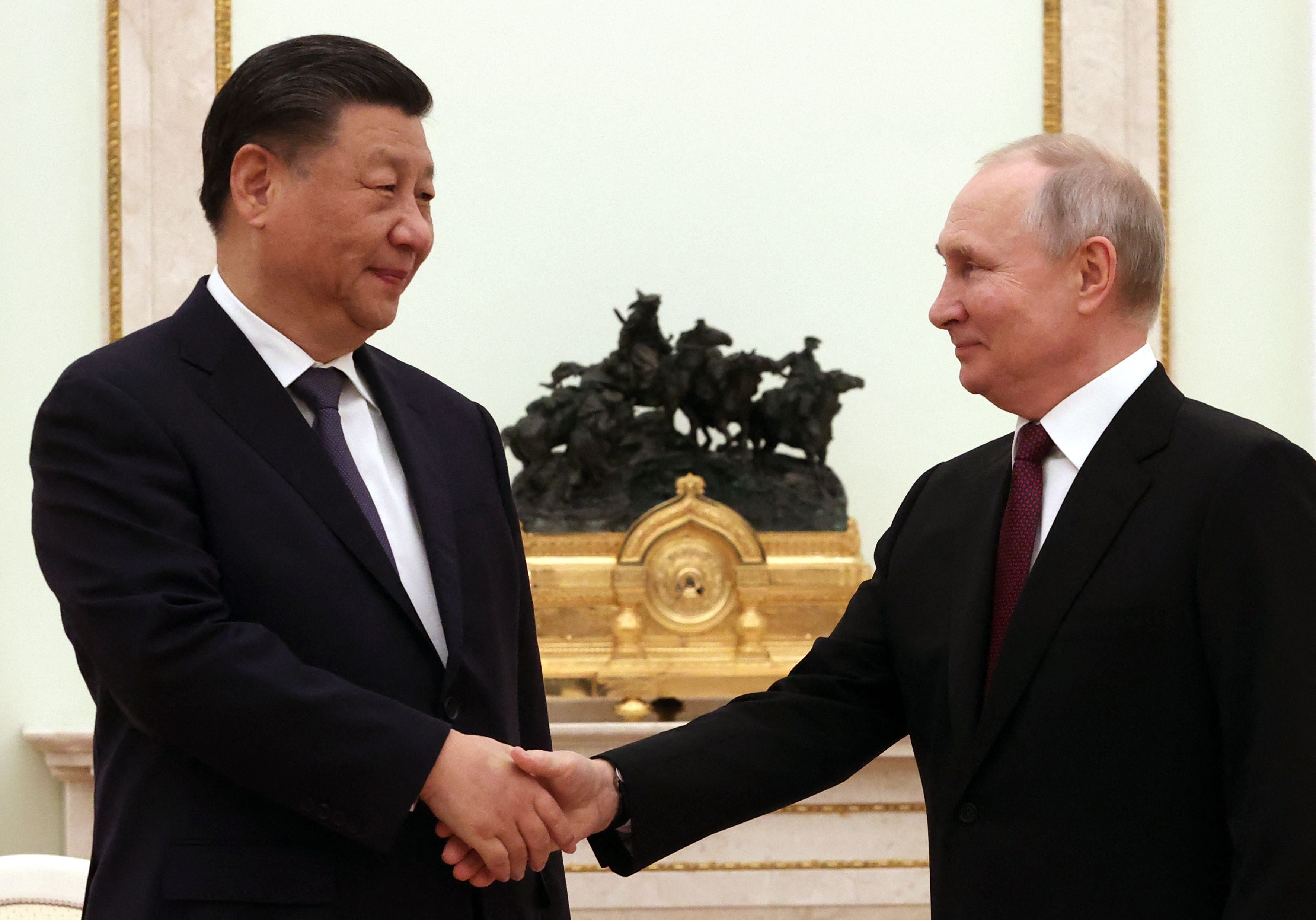 Vladimir Putin and Xi Jinping greeted each other as ‘dear friends’ at the Kremlin on Monday