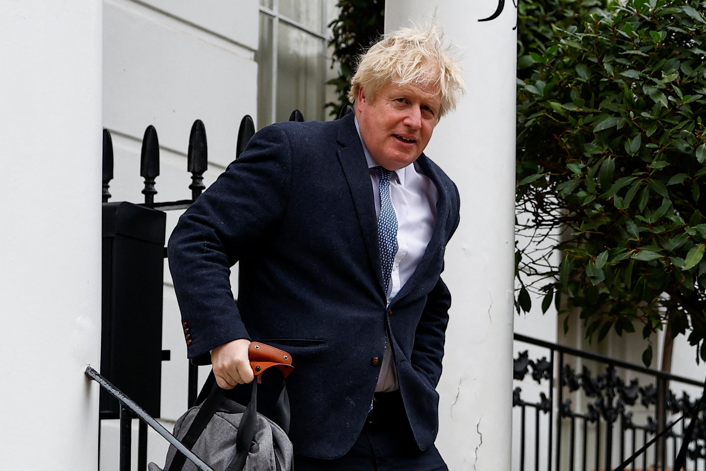 Boris Johnson outside his home on Tuesday