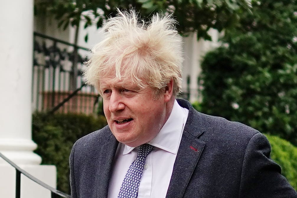 Boris Johnson outside his home on Tuesday