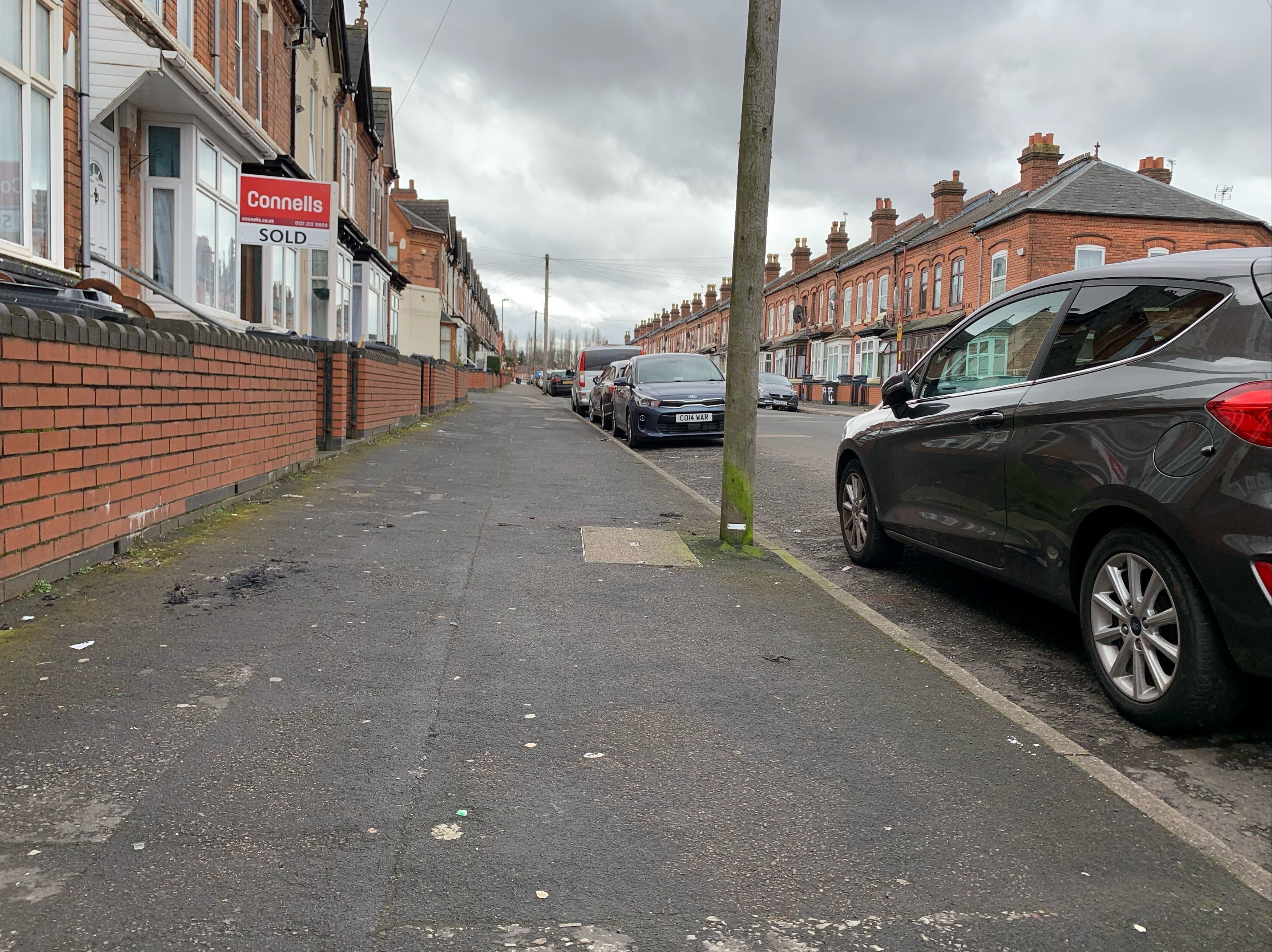 A man suffered facial burns after his jacket was set alight as he walked home from a mosque