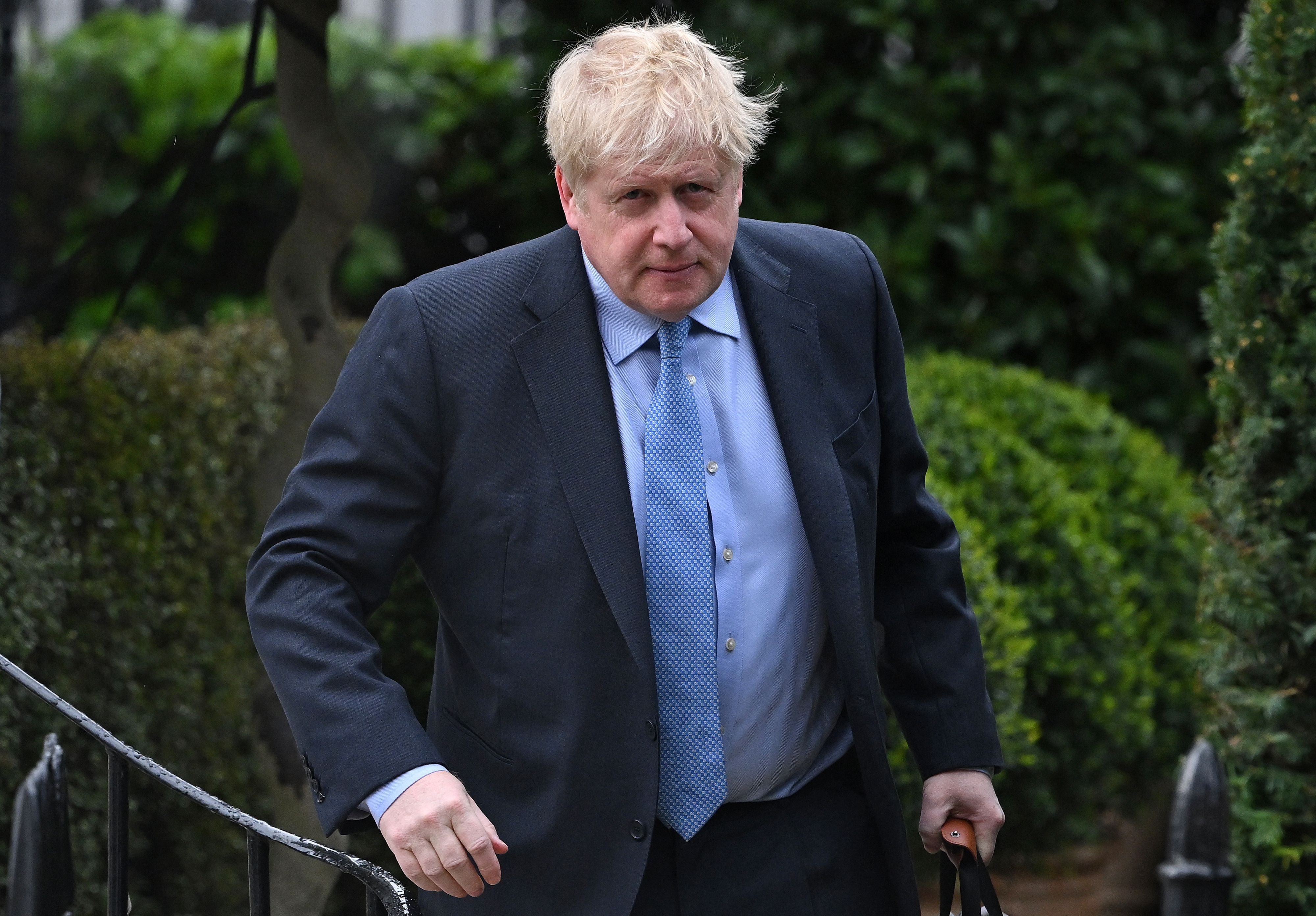 Boris Johnson leaves his home on Wednesday ahead of TV grilling