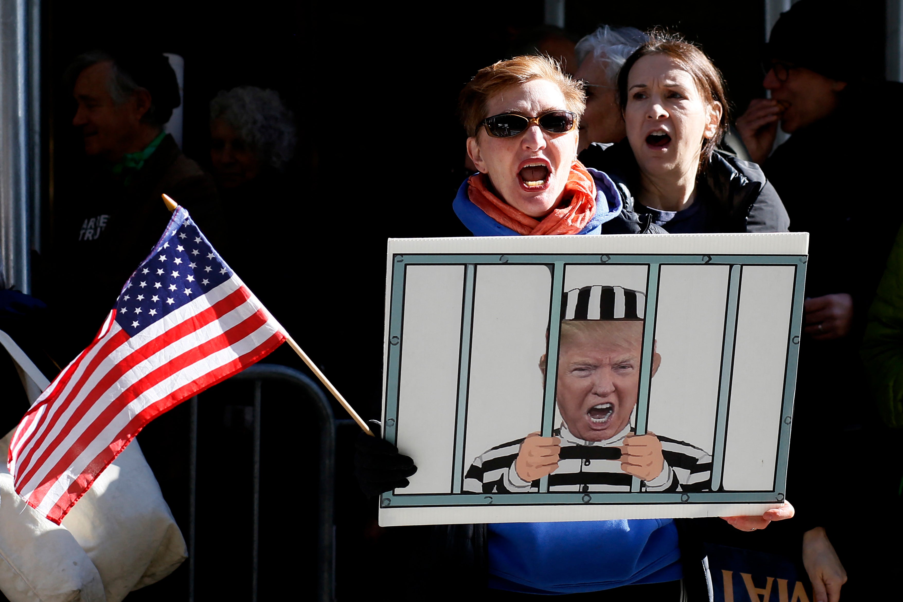 Anti-Trump demonstrators protest outside the Manhattan District Attorney’s office in New York City on Tuesday