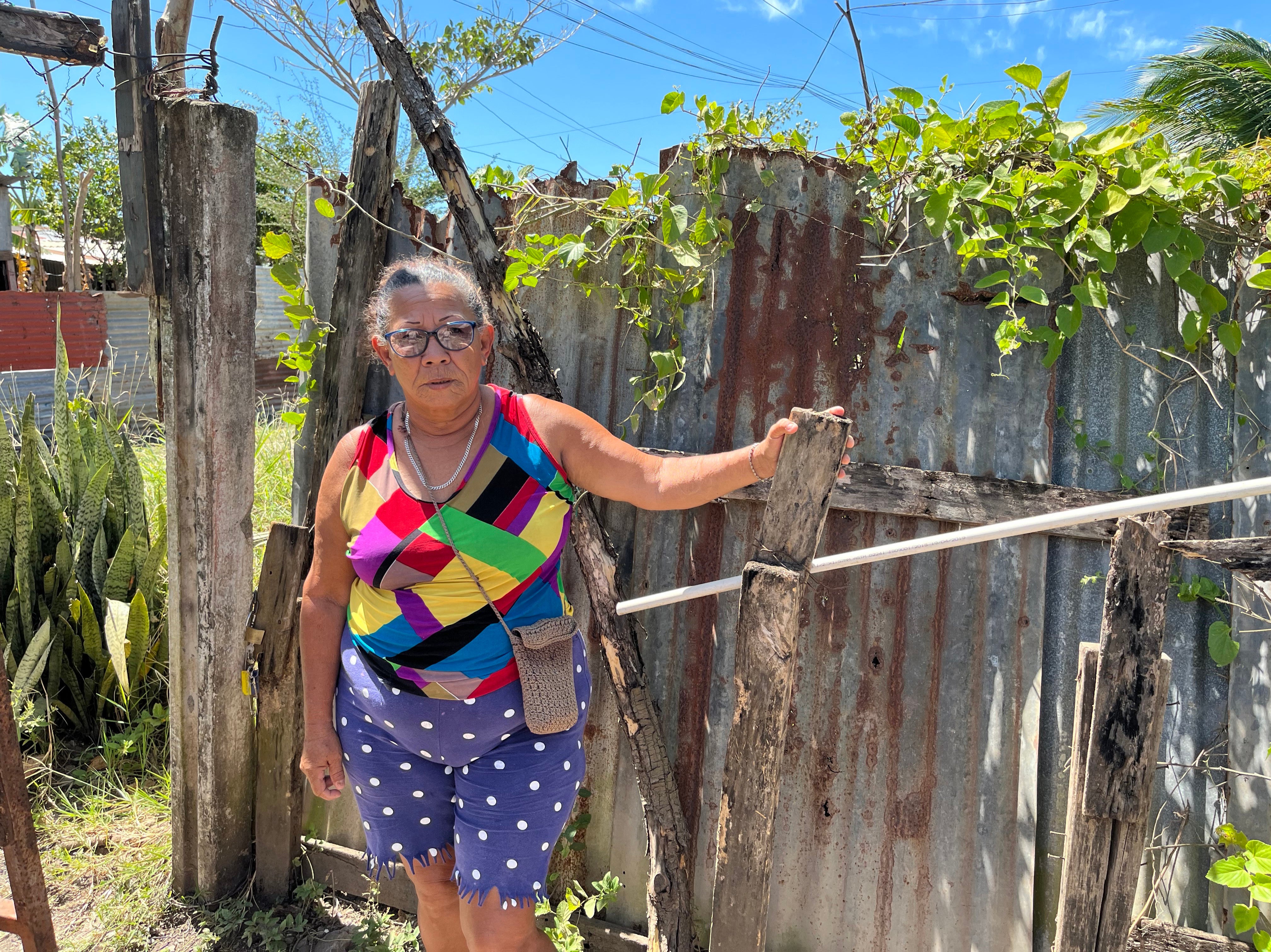 Maribel Sandi, who runs an association of shrimp peelers, outside her home in Bella Vista