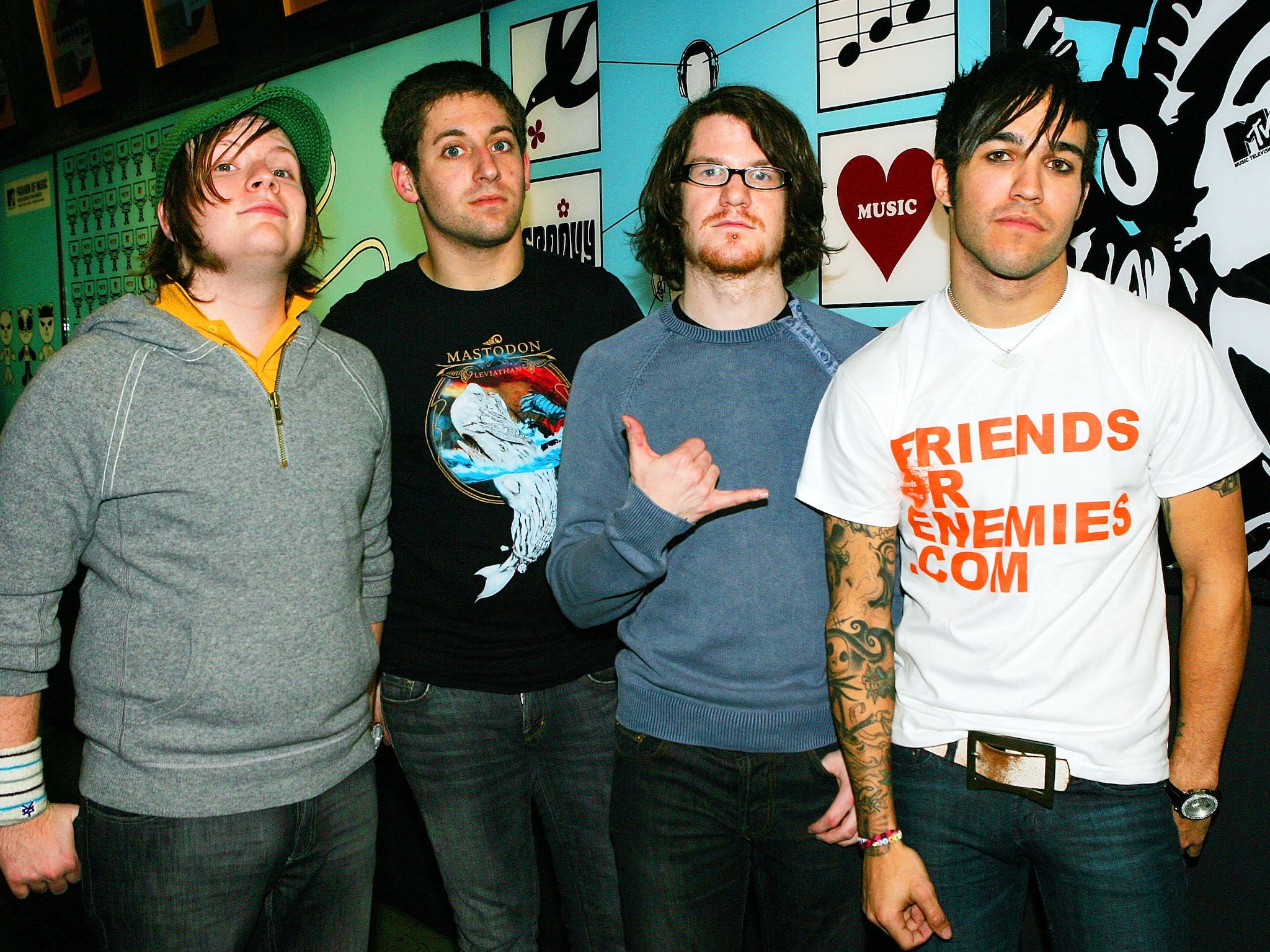 From left: Patrick Stump, Joe Trohman, Andrew Hurley and Pete Wentz backstage during MTV's Total Request Live in 2005