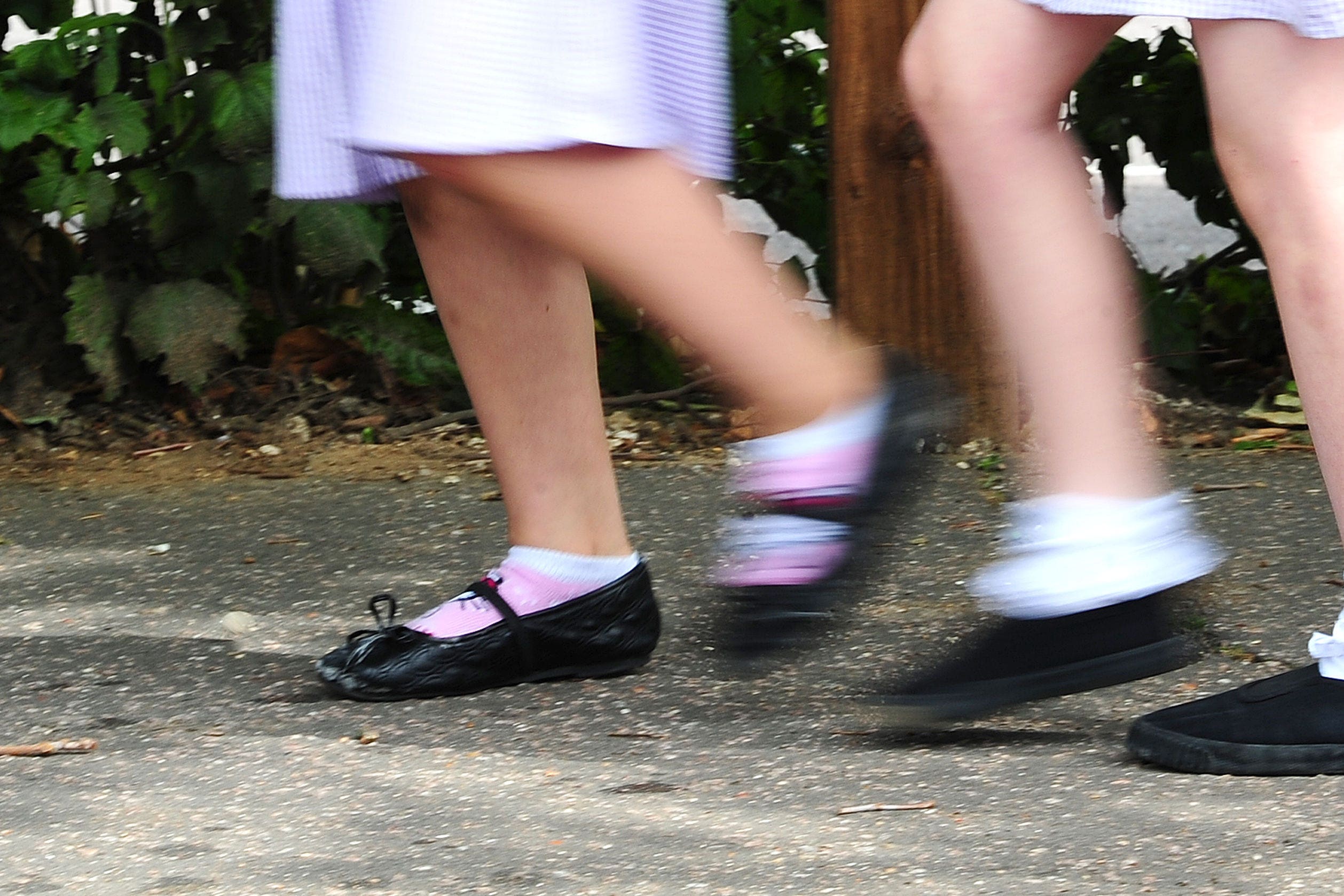 A generic stock photo of school girls walking to school (Ian West/PA)