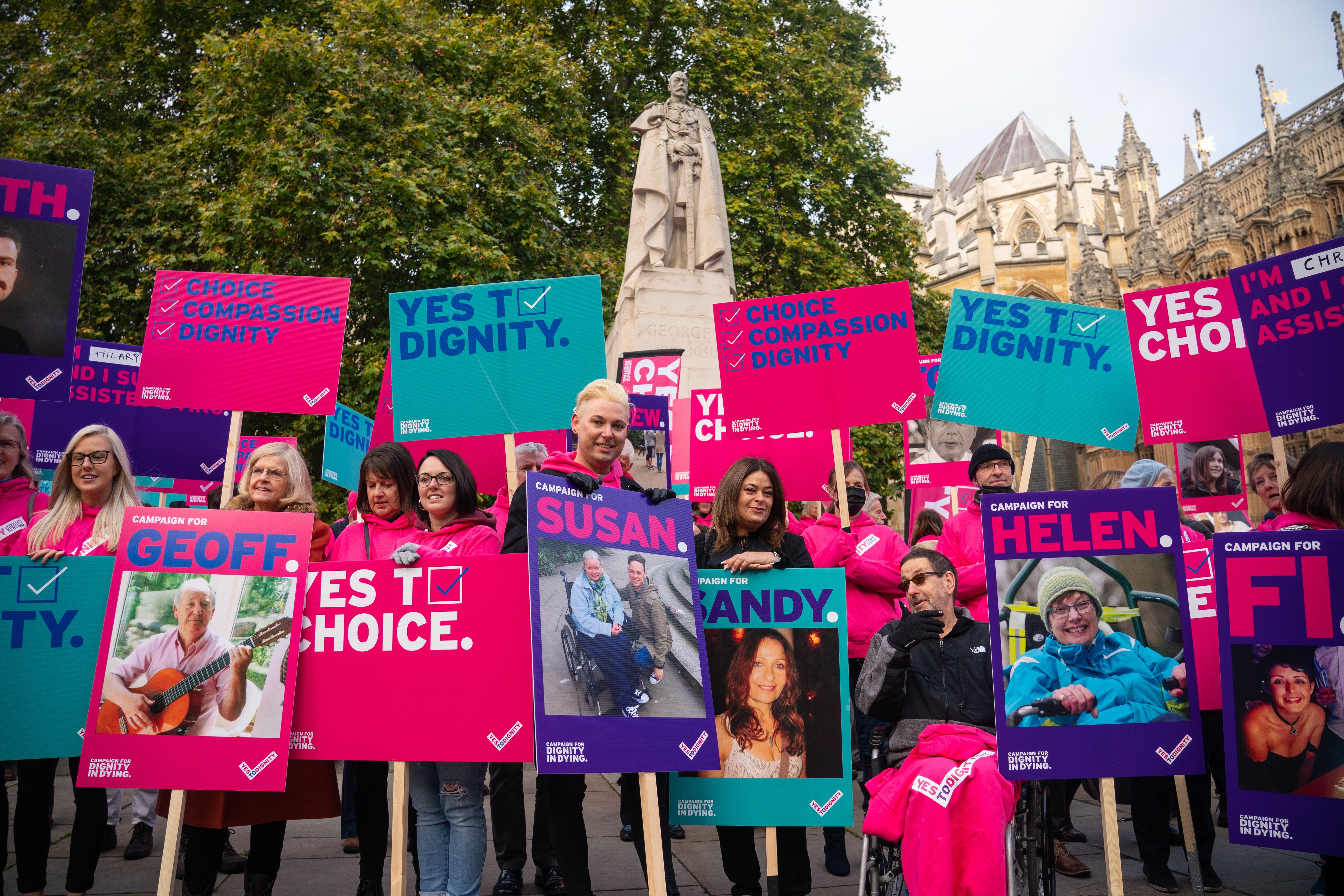 Demonstrators including Humanists UK members and supporters during a protest outside the Houses of Parliament to call for reform as peers debated the new assisted dying legislation in October 2021