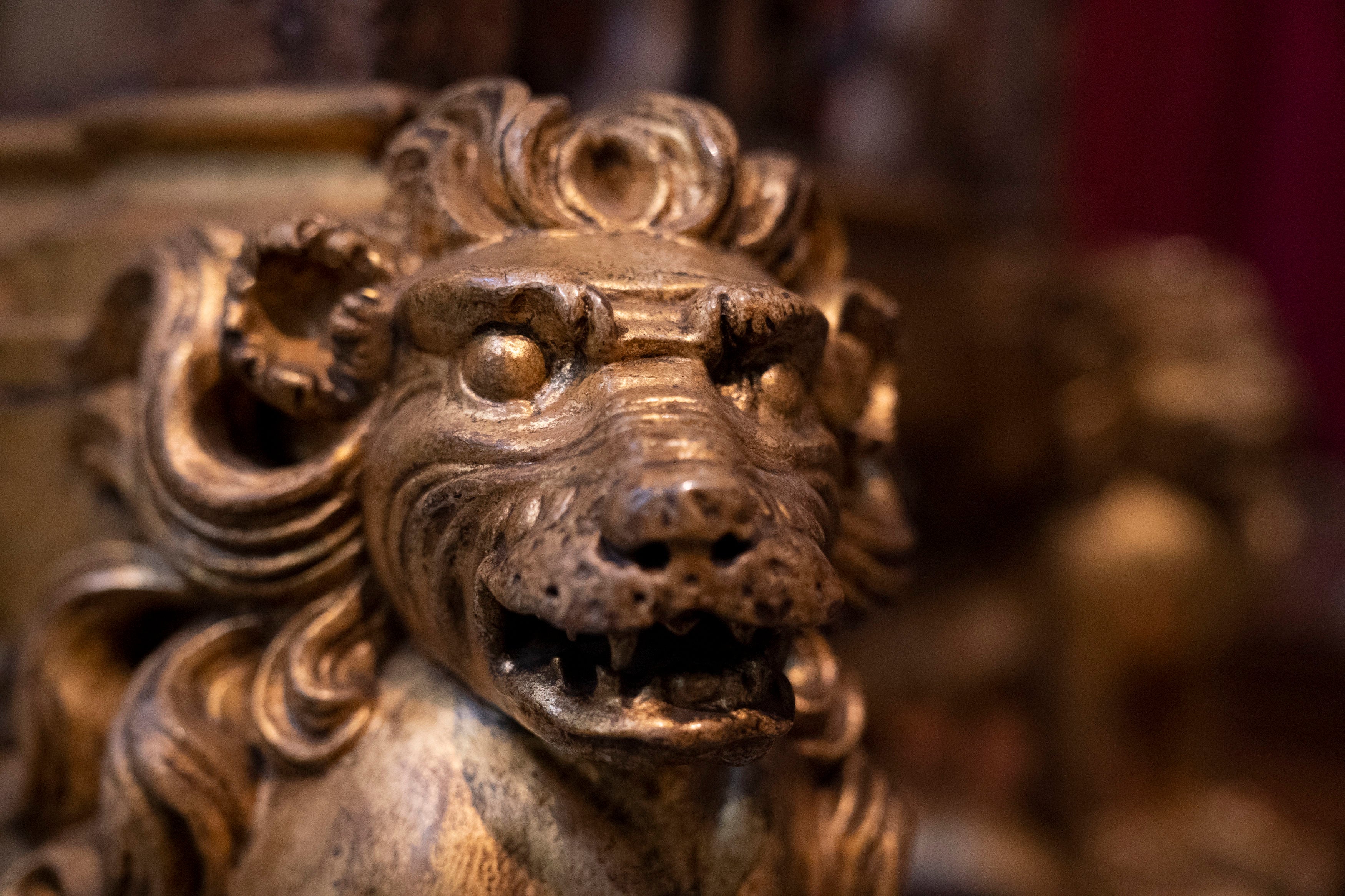 Detail of a lion on the Coronation chair, at Westminster Abbey in London