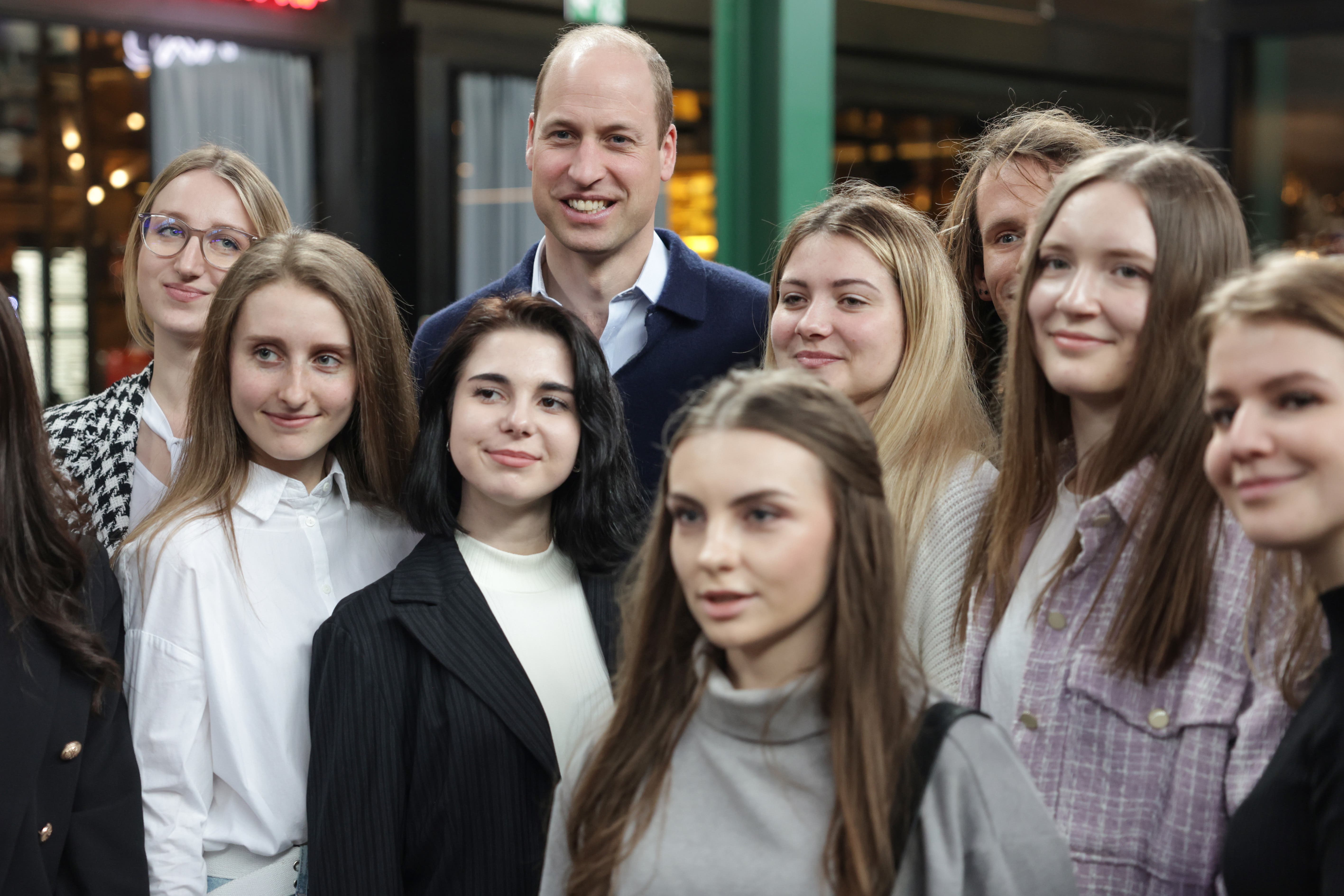 The Prince of Wales visits the Hala Koszyki food hall to meet young Ukrainian refugees who are now living and studying in Poland, and members of the Polish community hosting them, during his trip to Warsaw, Poland (Chris Jackson/PA)