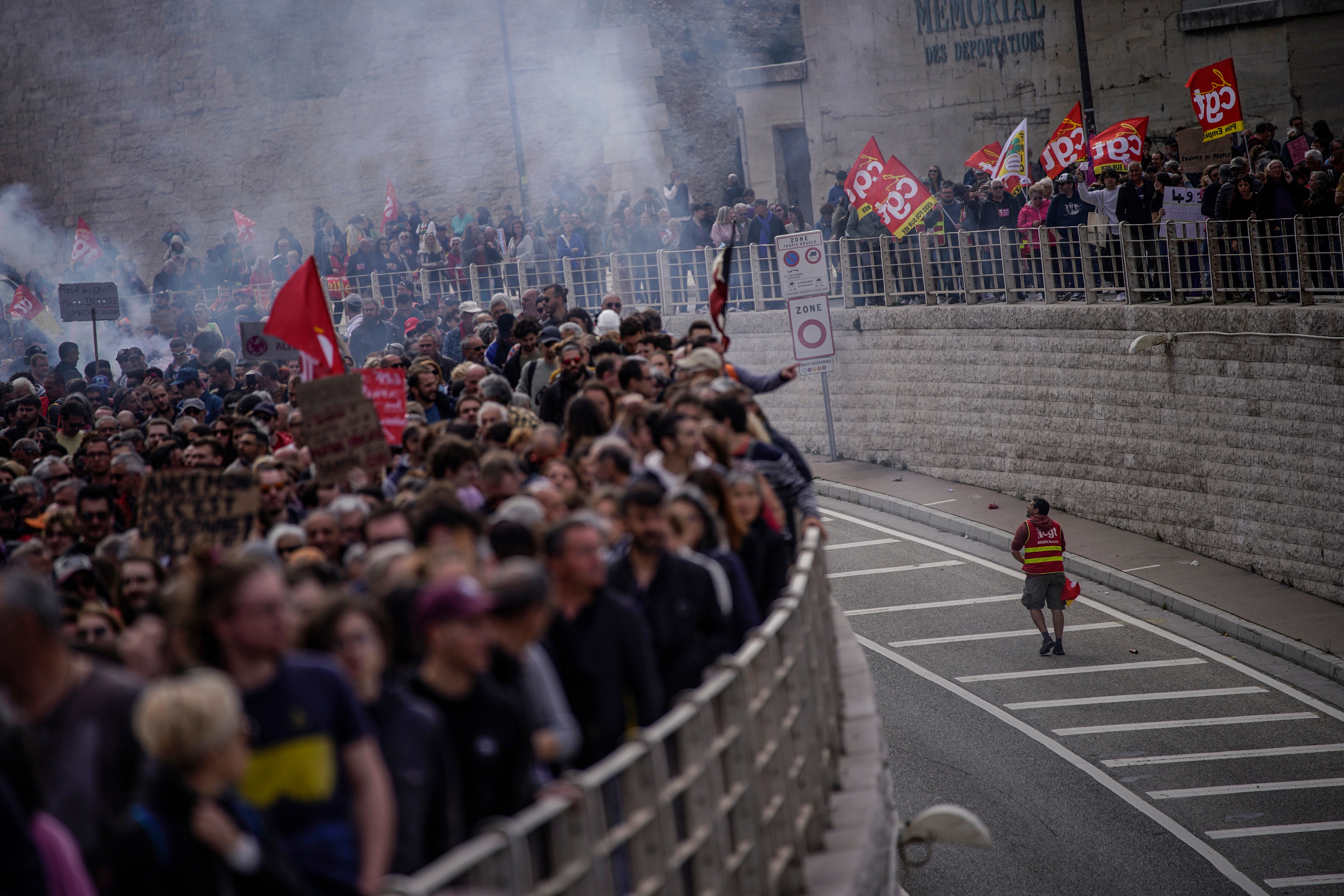 Protesters march during a rally in Marseille on Thursday