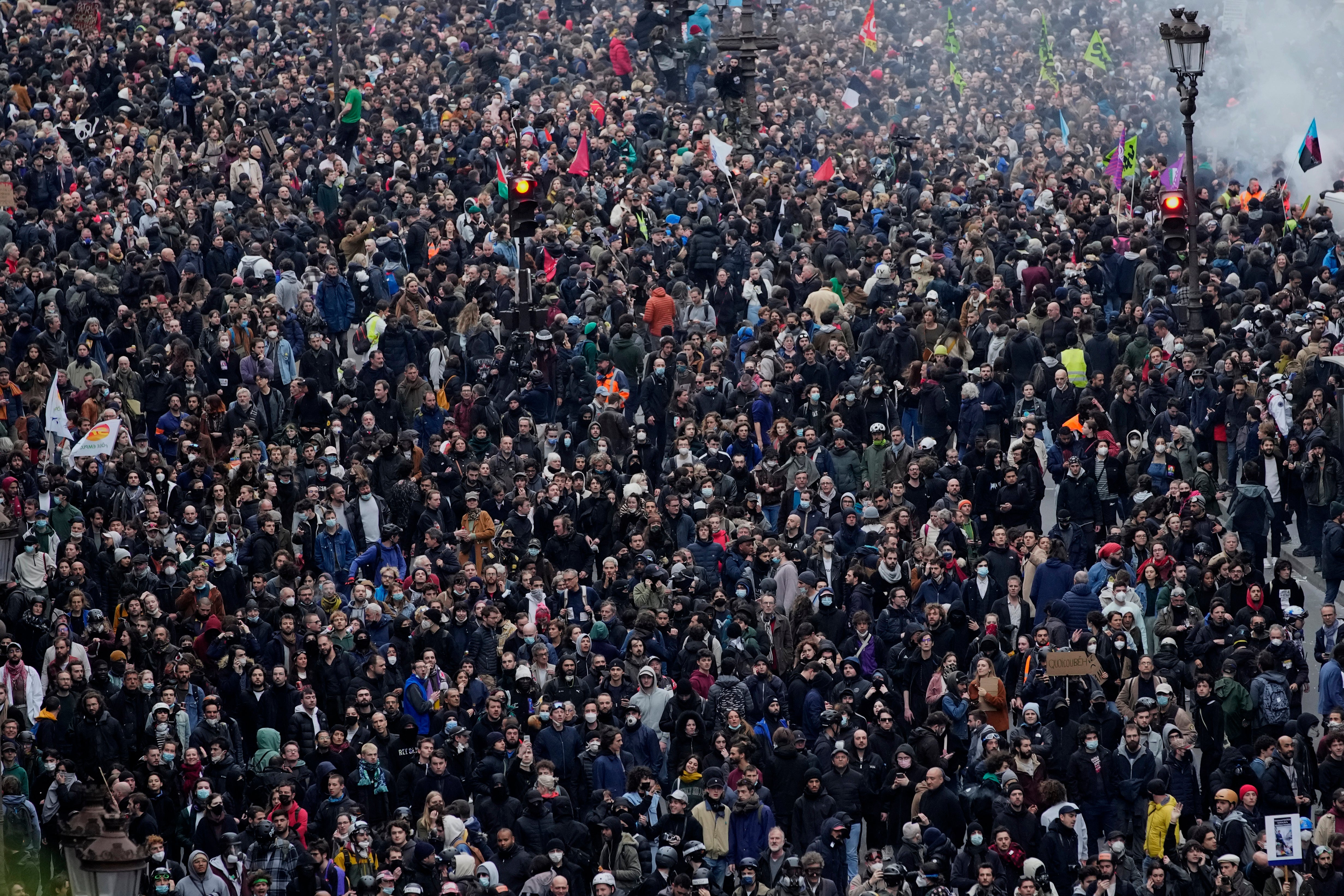 Protesters march during a rally in Paris on Thursday