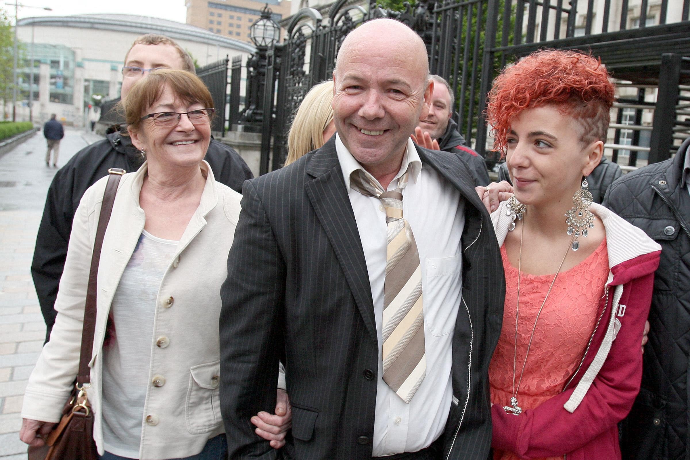 Liam Holden with his family outside the Court of Appeal in Belfast after he had his conviction for murder quashed (Paul Faith/PA)