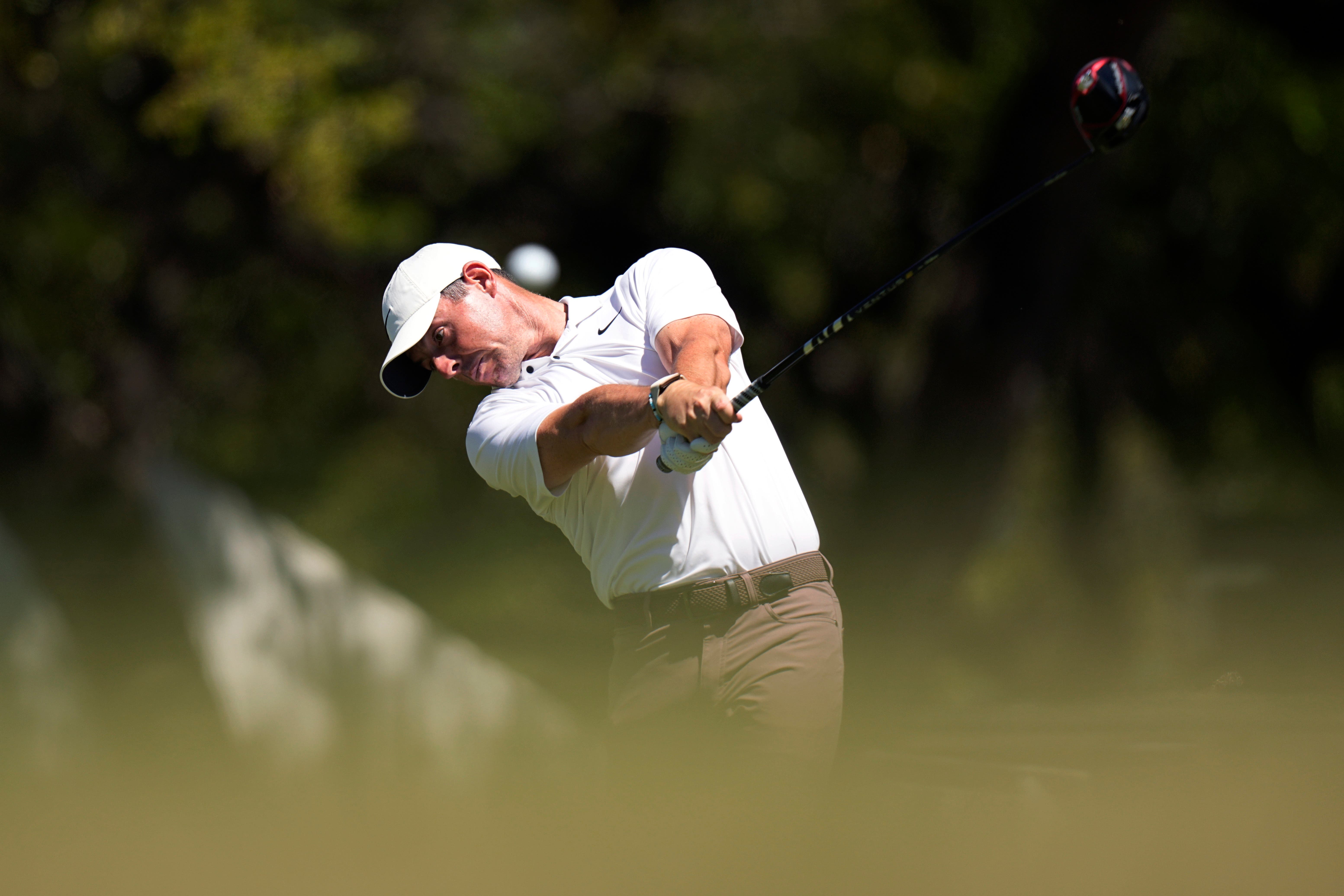 Rory McIlroy eased into the last 16 of the WGC-Dell Technologies Match Play in Austin (Eric Gay/AP)