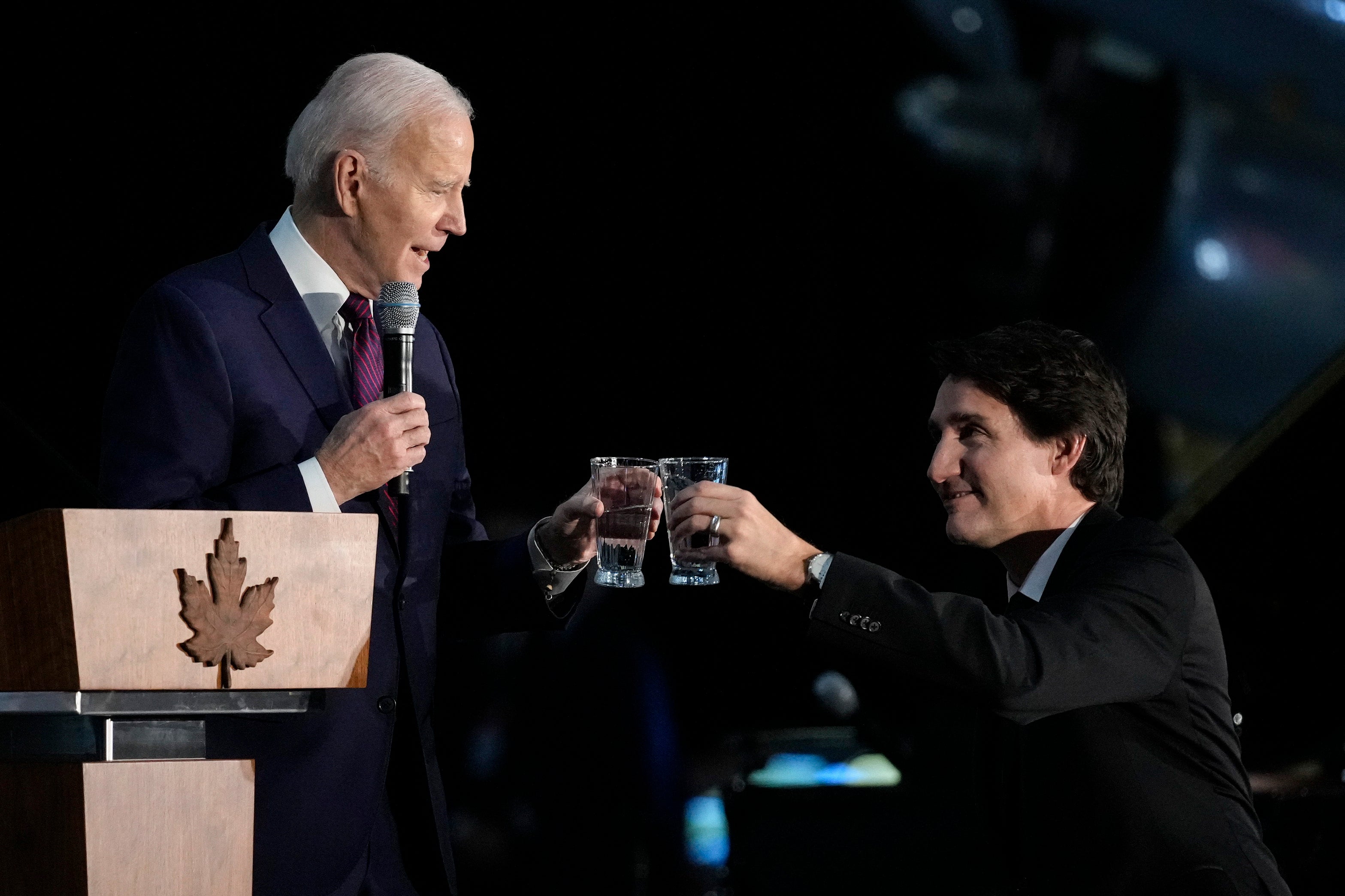 US president Joe Biden toasts with Canadian prime minister Justin Trudeau