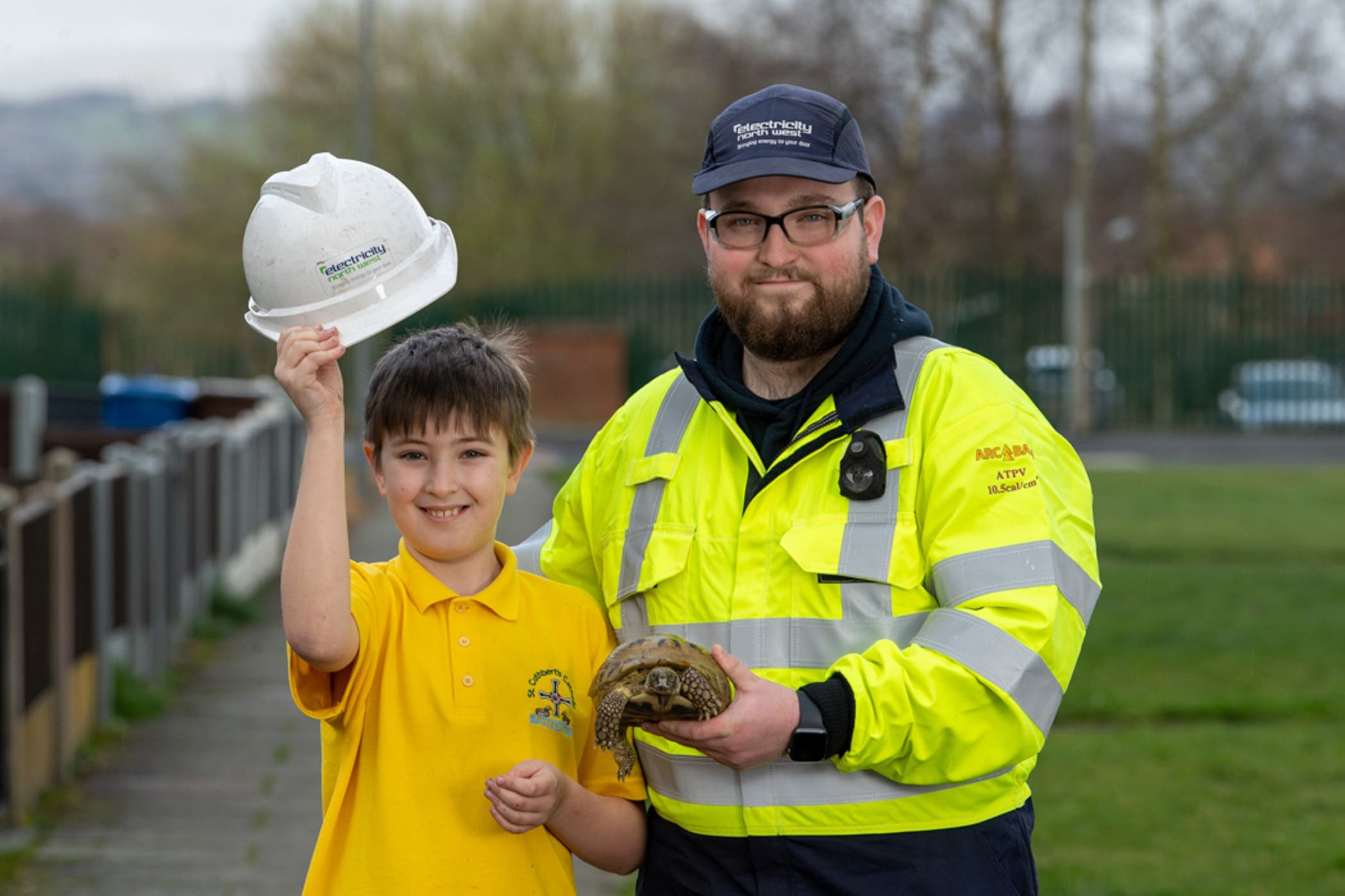 From left: Harvey Dean-Evans, Mary and Ben Baxendale (Ian Robinson/Electricity North West/PA)