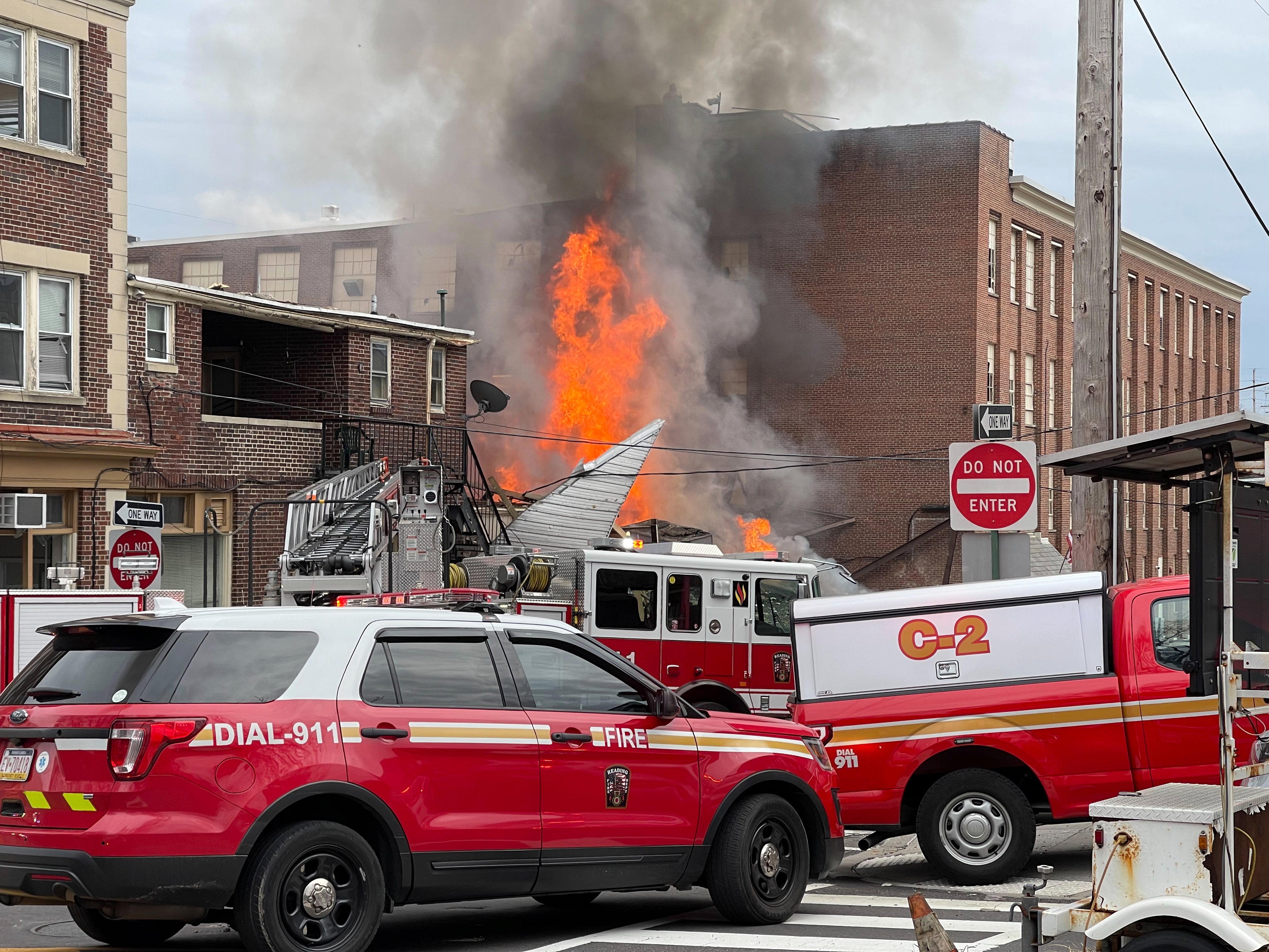 Emergency personnel work at the site of a deadly explosion at a chocolate factory in West Reading, Pa., Saturday, March 25, 2023