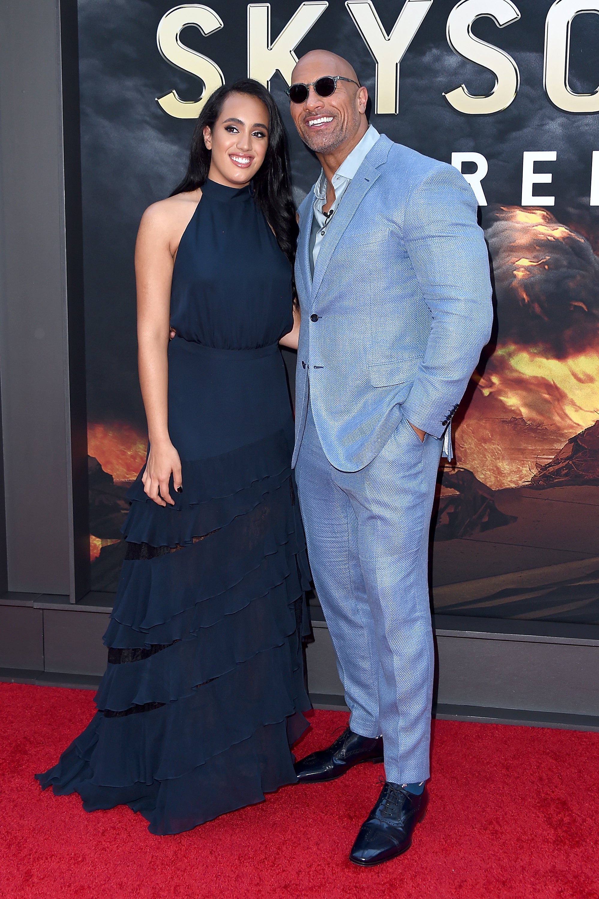 Dwayne Johnson and his daughter Simone Garcia Johnson attend the 'Skyscraper' New York Premiere at AMC Loews Lincoln Square on July 10, 2018