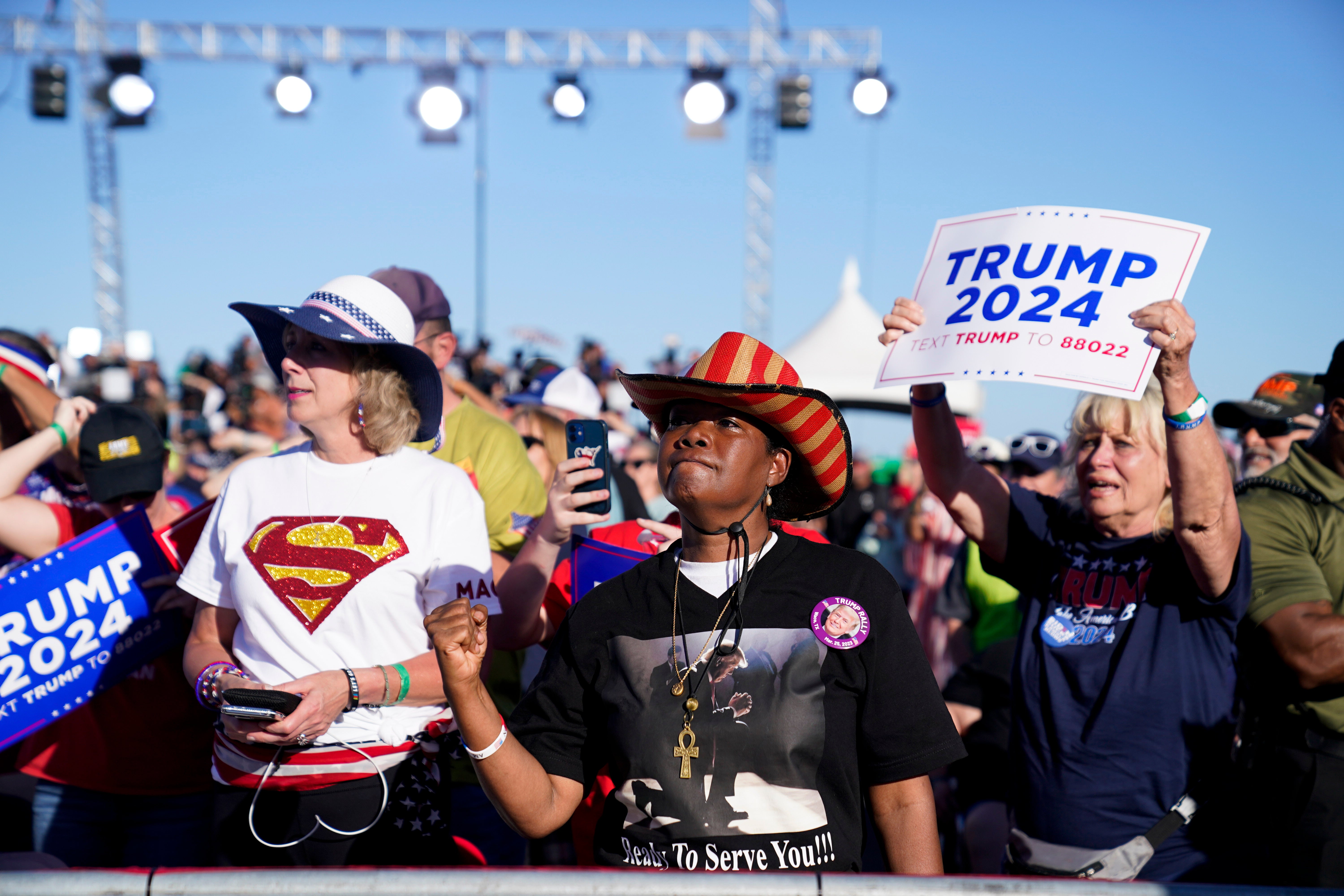 Supporters of former President Donald Trump react as he speaks at a campaign rally at Waco Regional Airport, Saturday, March 25, 2023, in Waco, Texas. (AP Photo/Evan Vucci)