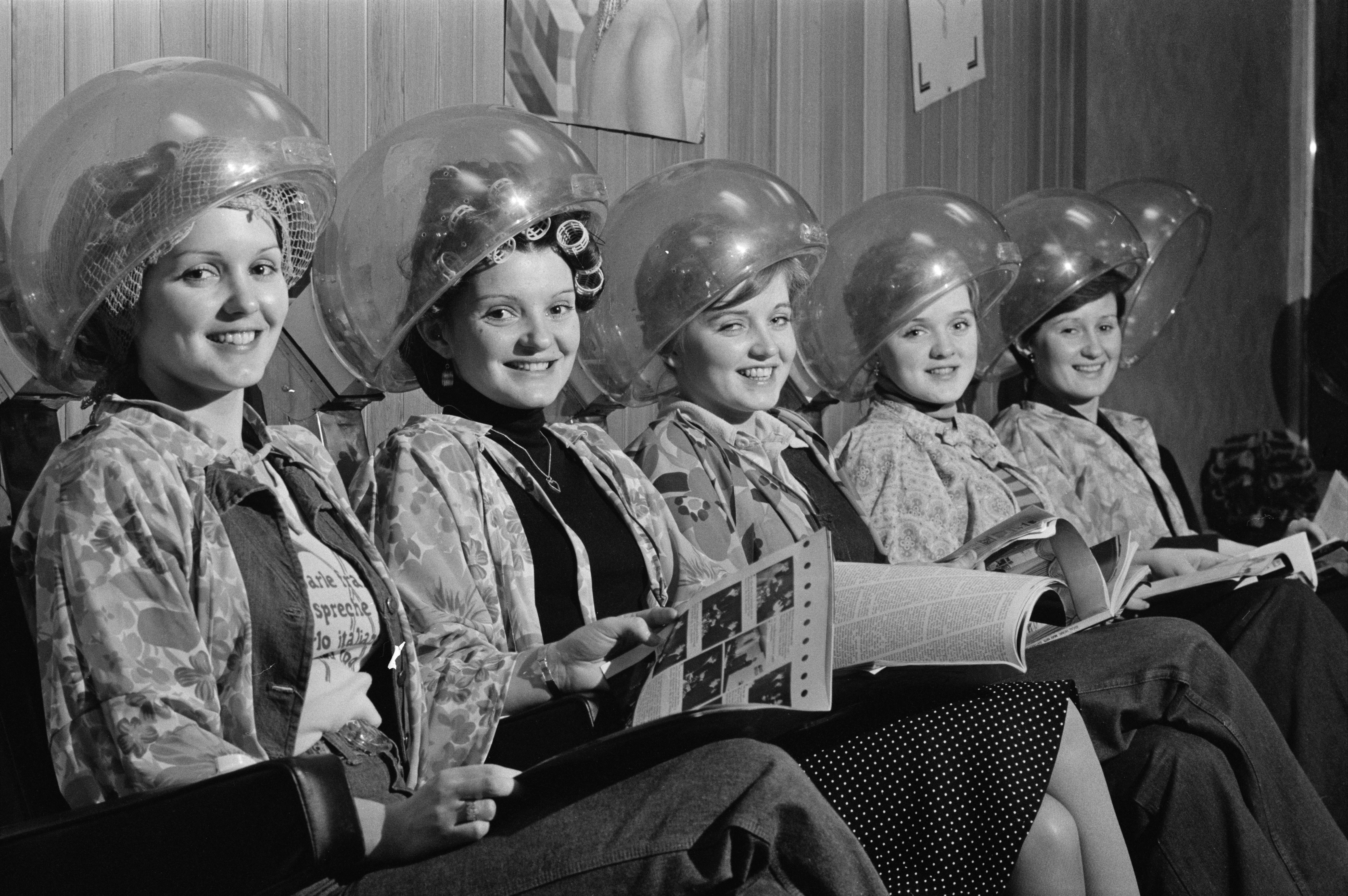 Irish girl group The Nolan Sisters at an hairdresser, UK, 6th November 1975; they are (not in order) Maureen, Anne, Bernie, Linda and Denise Nolan