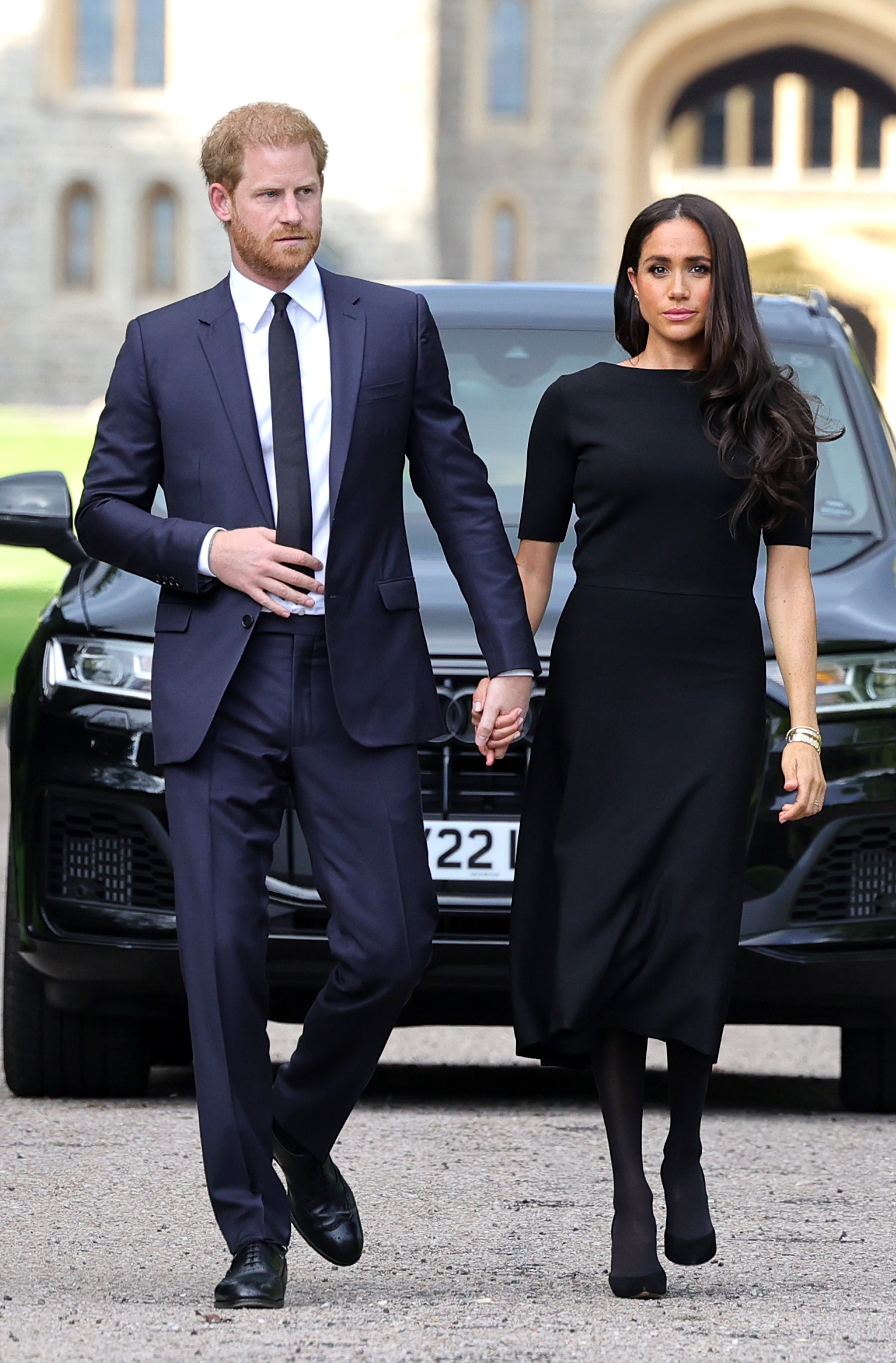 Harry and Meghan viewing flowers left by well-wishers in Windsor following the late Queen’s death