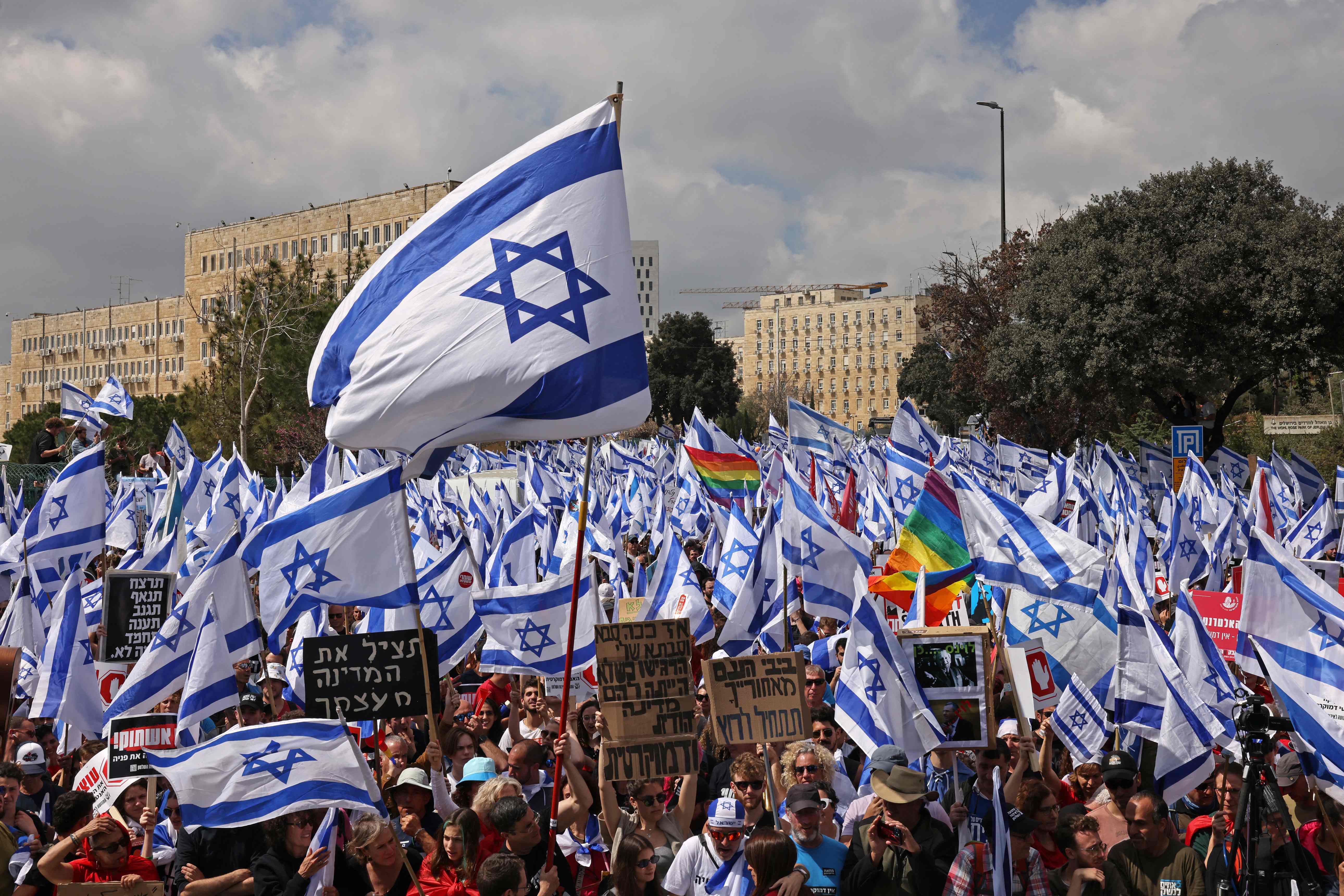 Protesters gather outside Israel's parliament in Jerusalem amid ongoing demonstrations and calls for a general strike against the hard-right government's controversial push to overhaul the justice system