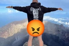 Russian tourist apologises after posing naked on sacred Bali mountain