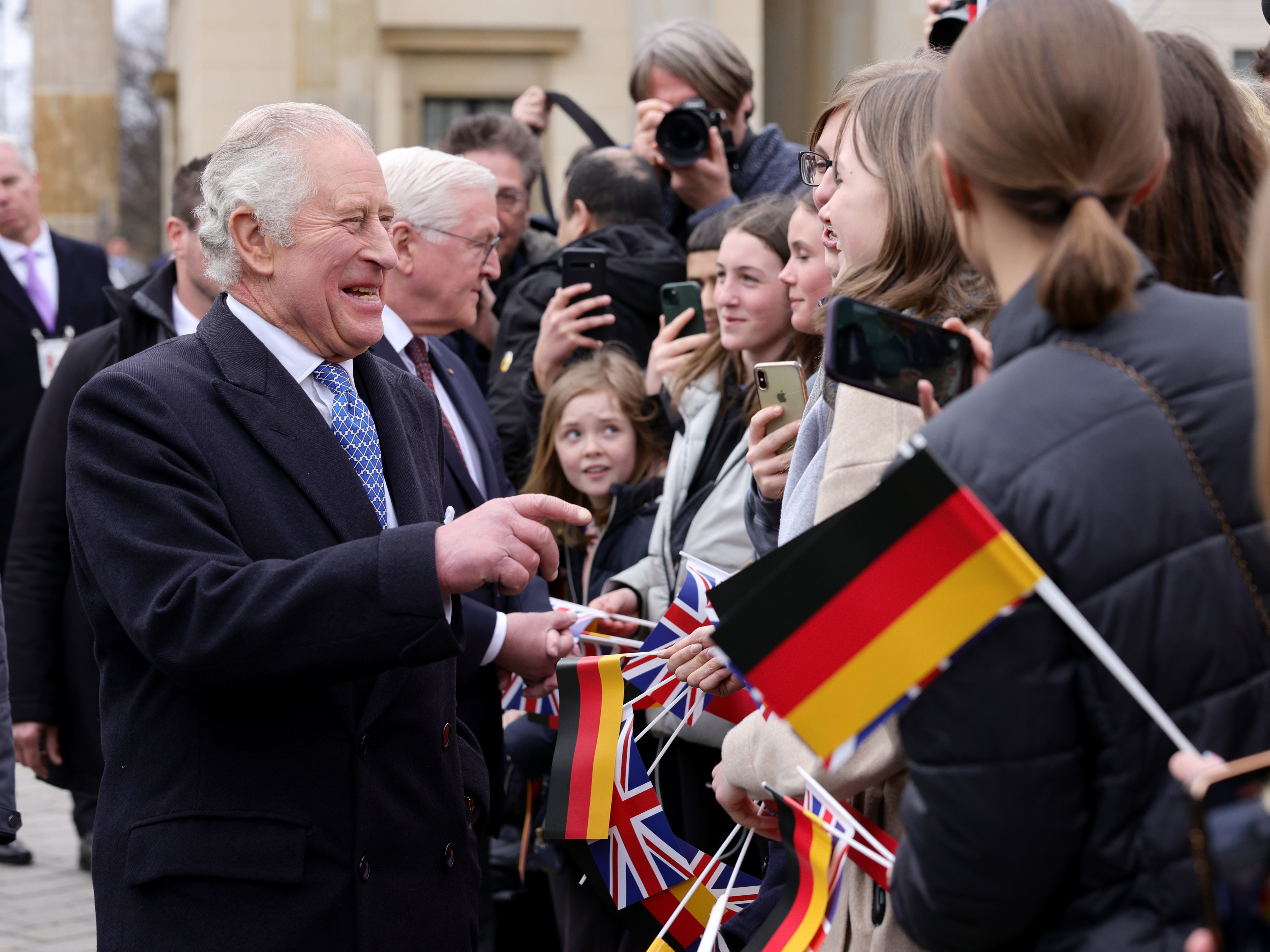 Charles III greets the crowd during the Ceremonial welcome at Brandenburg Gate