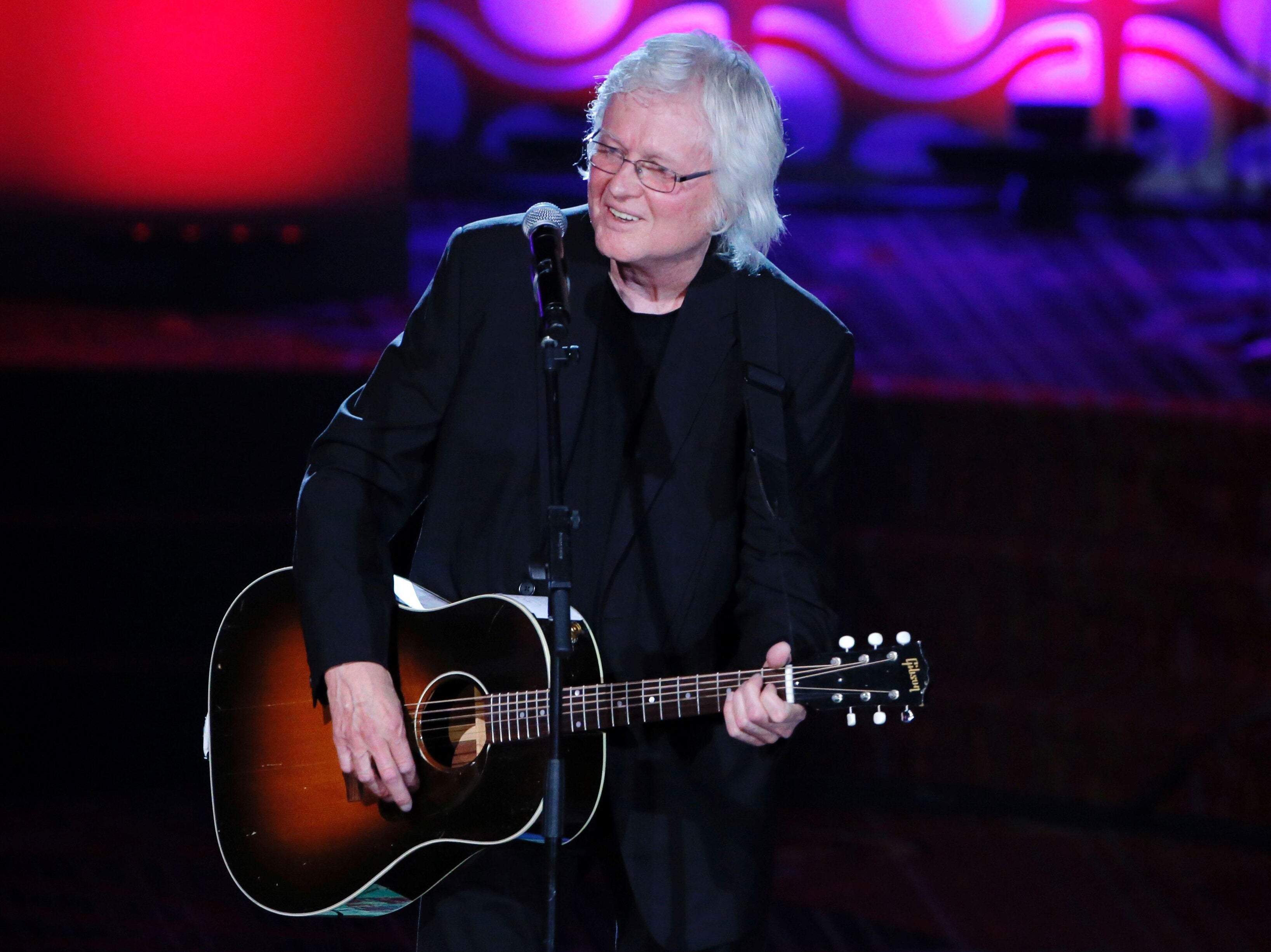 Chip Taylor performs on stage after being inducted into the Songwriters Hall of Fame in New York in 2016