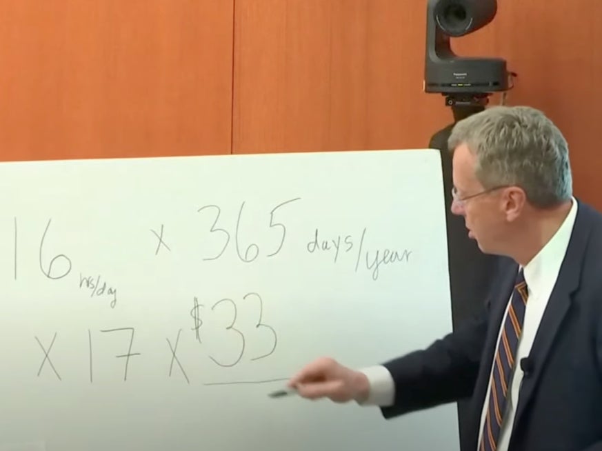 A lawyer for Terry Sanderson writes up an equation during closing arguments