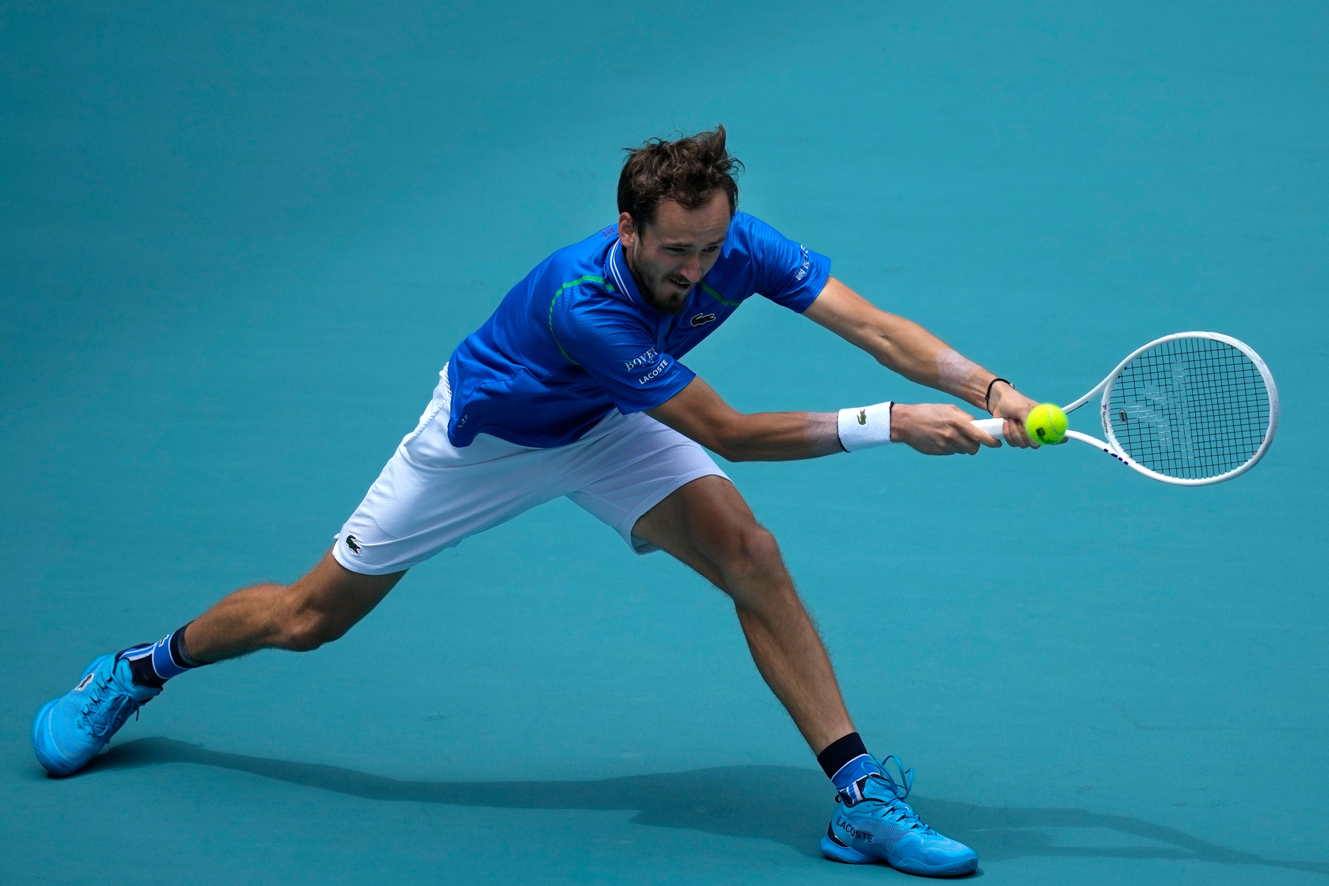 Daniil Medvedev stretches for a backhand against Christopher Eubanks (Rebecca Blackwell/AP)