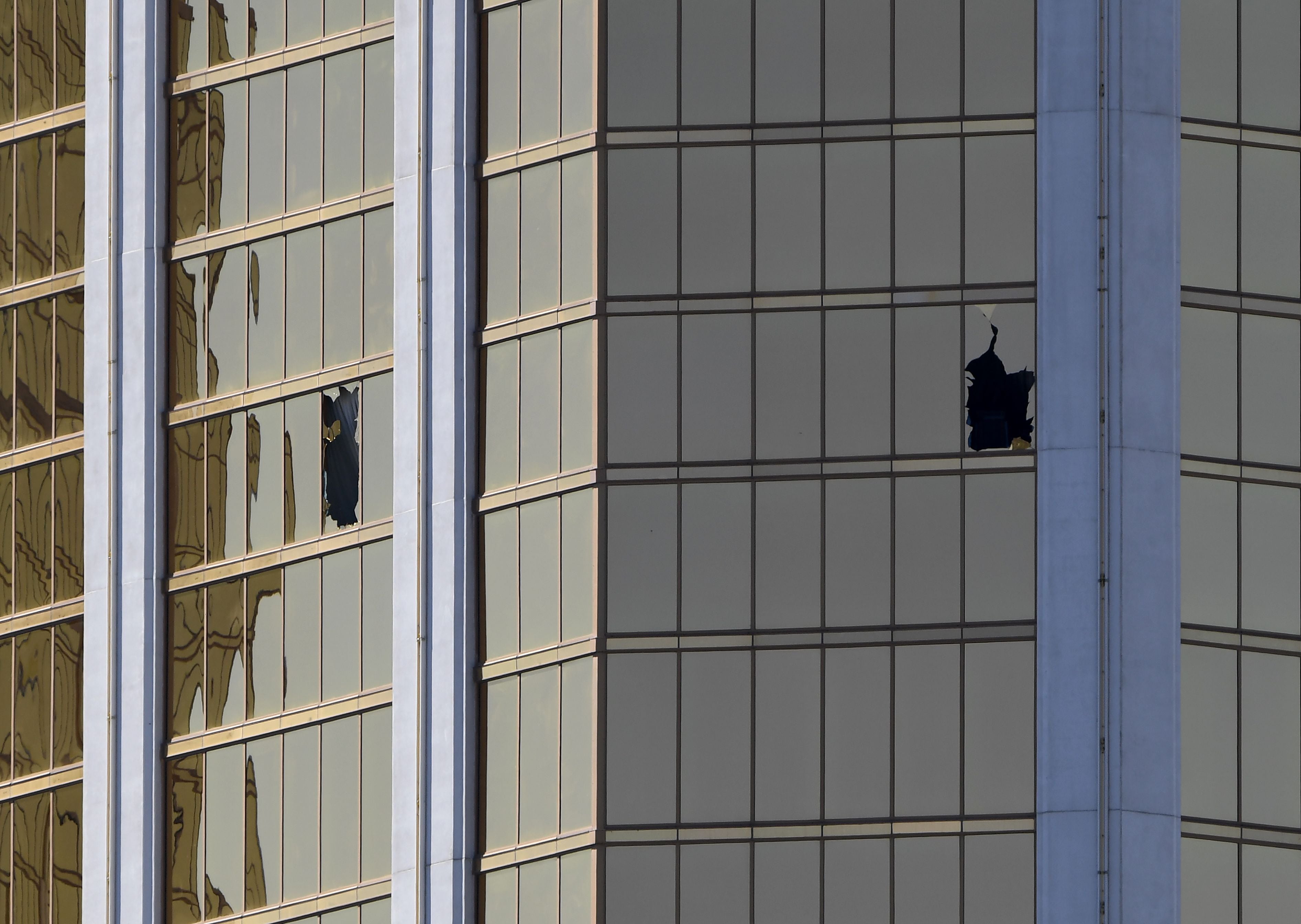 Damaged windows on the 32nd floor of the Mandalay Hotel in Las Vegas through which Paddock fired