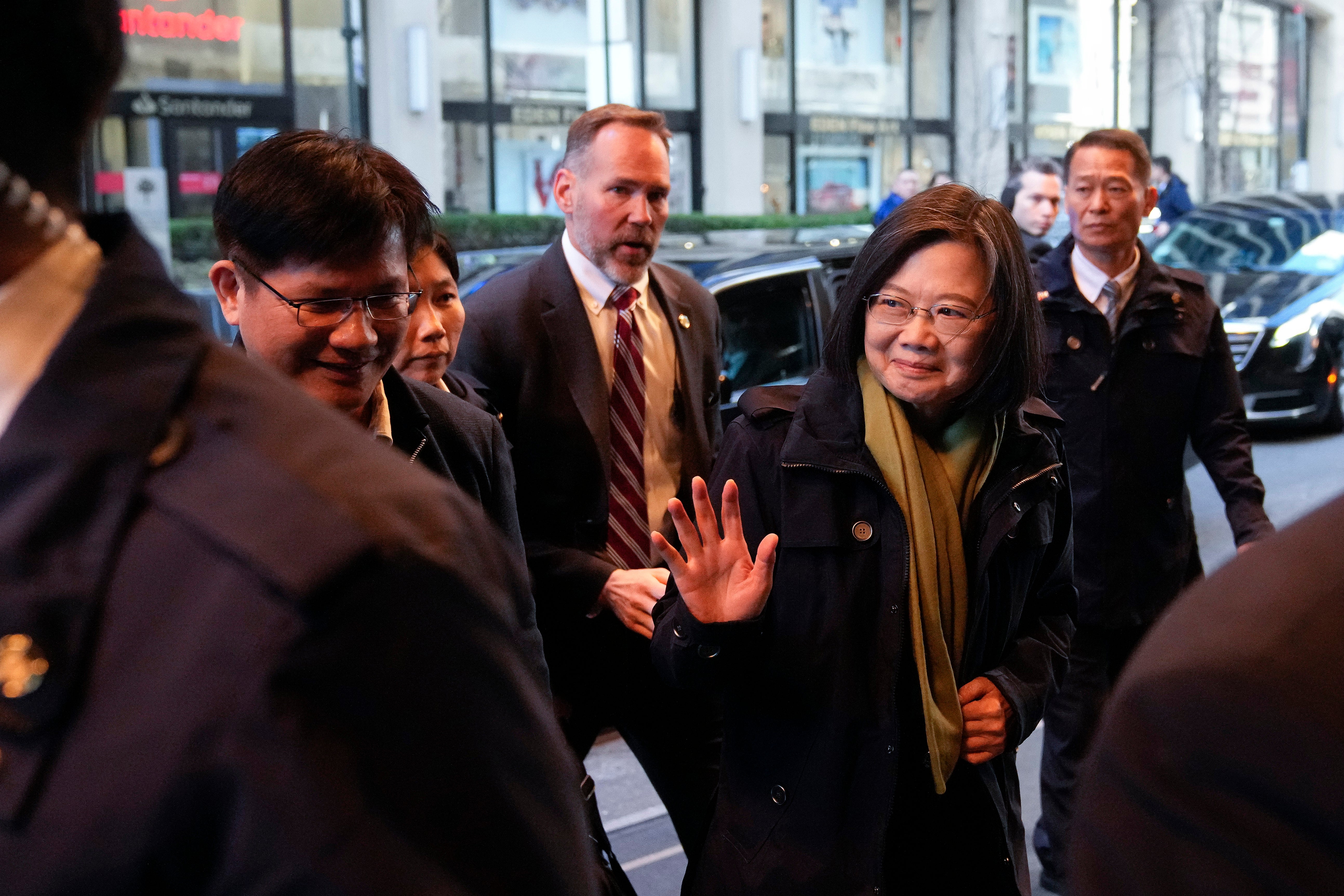 Taiwan’s president Tsai Ing-wen waves as she arrives at a hotel, in New York