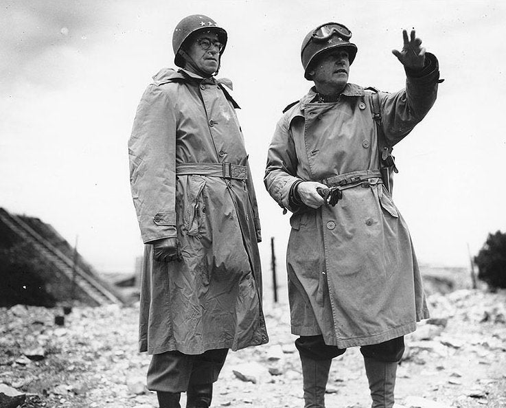 Top Operation Cobra commander, Major General J Lawton Collins (right) pictured speaking to Lieutenant General Omar Bradley (left) in Normandy in 1944