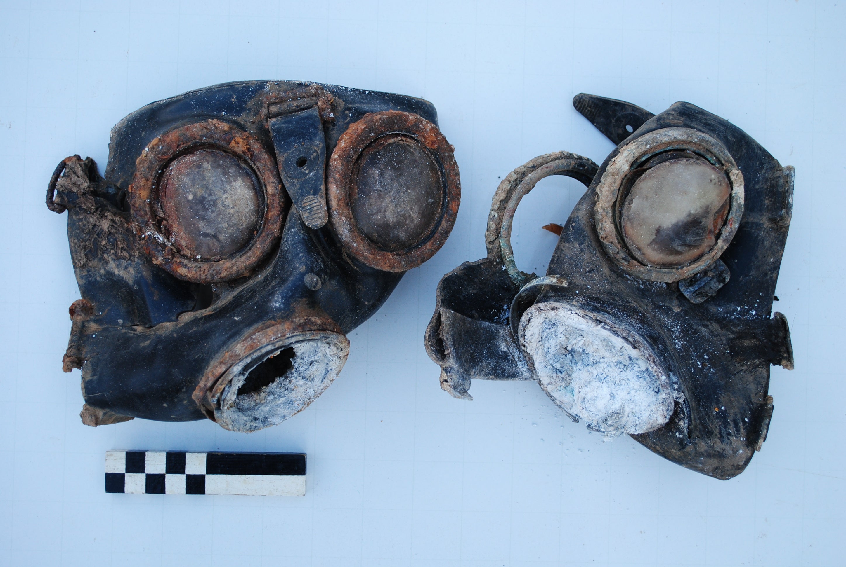 Two German gas masks, discovered by the archaeologists in a German dugout