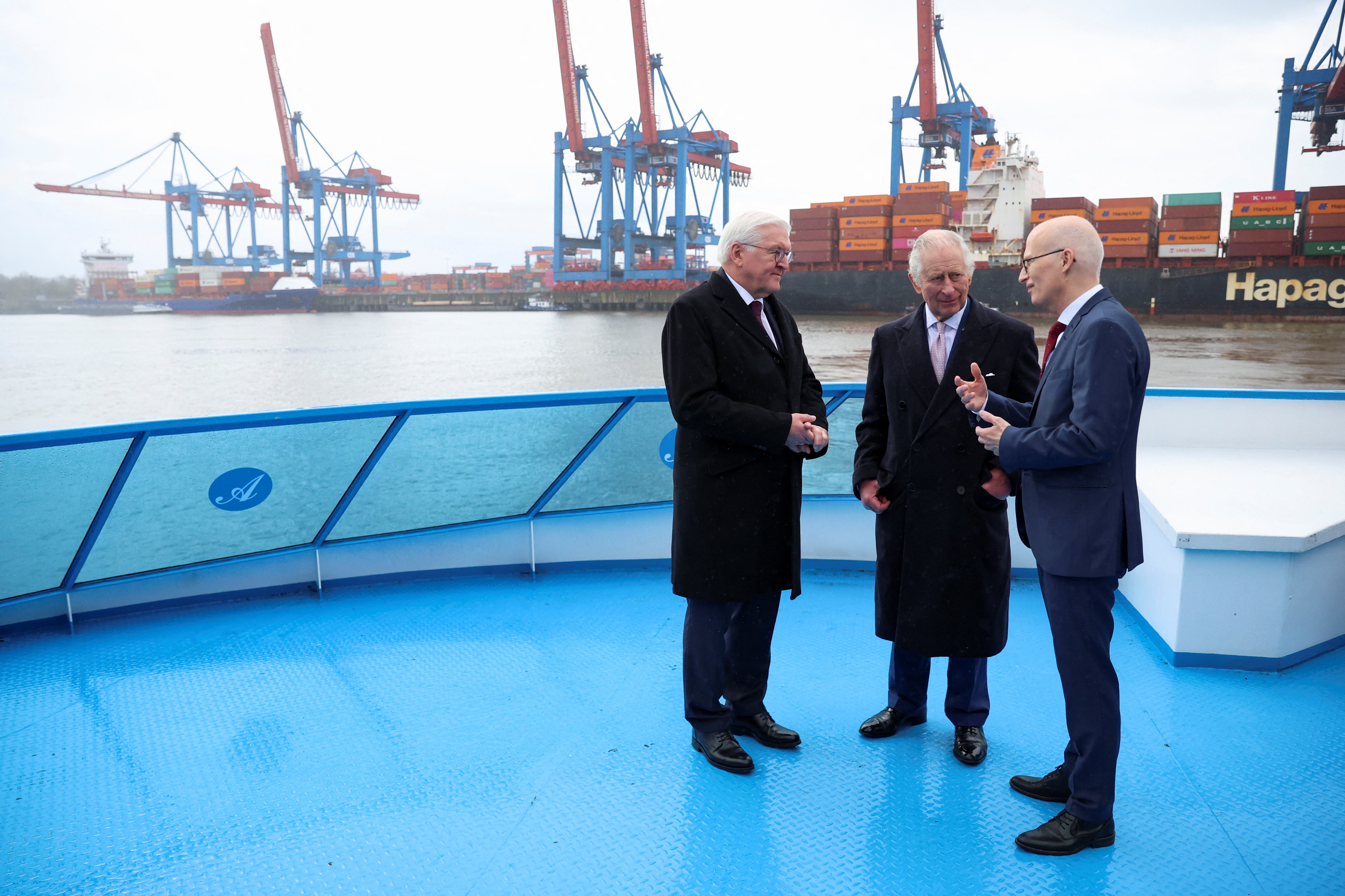 The King with German president Frank-Walter Steinmeier (left) during a visit to the Port of Hamburg (Phil Noble/PA)