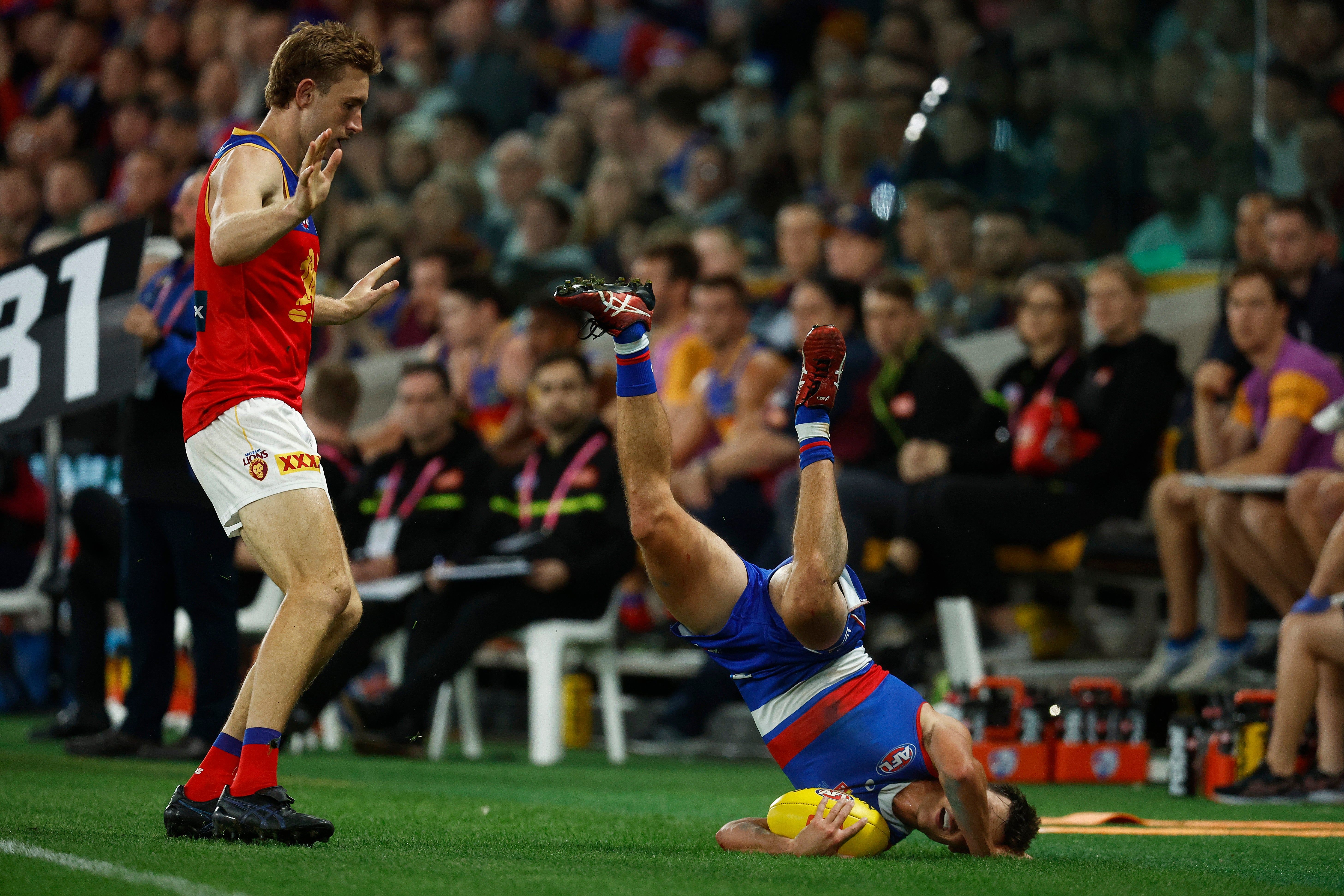 Jaspa Fletcher and Harris Andrews during the round three AFL match between Western Bulldogs and Brisbane Lions at Marvel Stadium