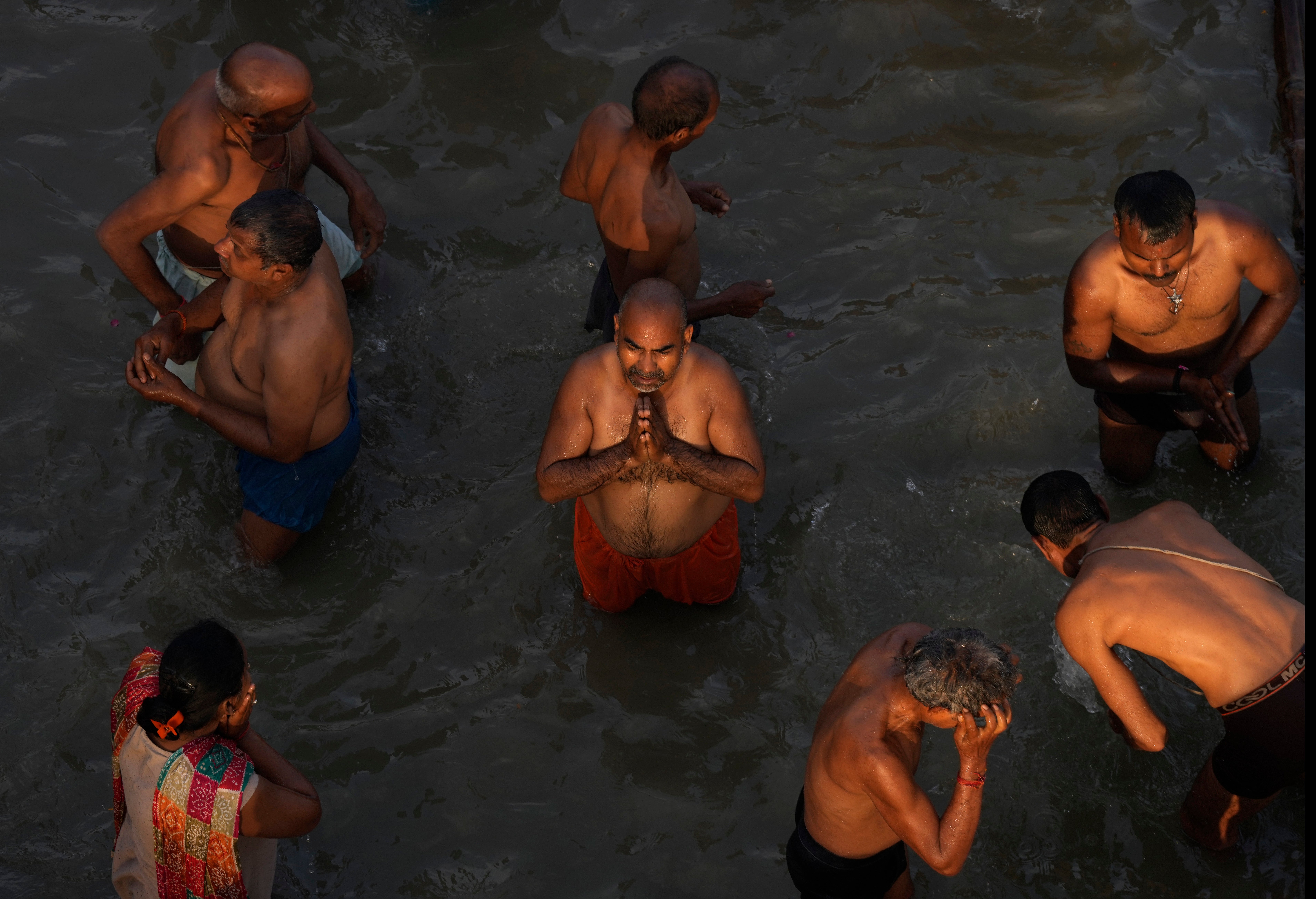 Devotees take holy dips and pray in the river Saryu on the occasion of Ramnavi festival, celebrated as the birthday of Hindu God Rama, in Ayodhya, India