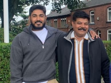 The 21-year-old with his father Amar Abraham (right), who has claimed his son was being bullied and suffered racism