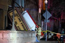 One dead, dozens injured in theatre roof collapse as tornado rips through Illinois