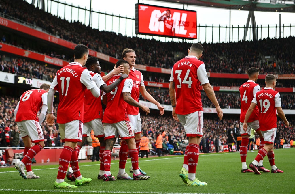 The Brazilian is congratulated by teammates after his opening goal